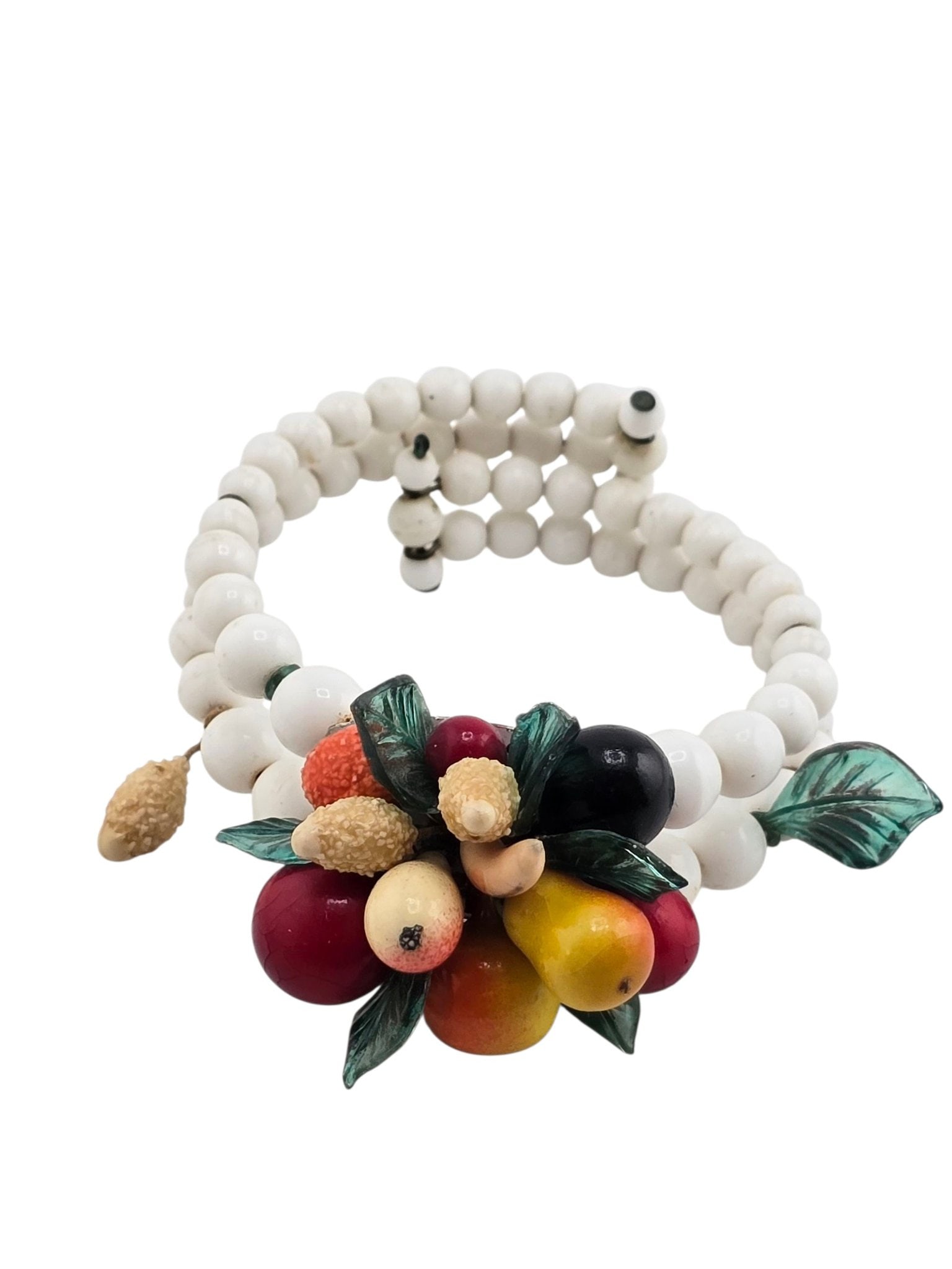 GERMANY SIGHED MILK GLASS FRUIT SALAD WRAP BRACELET: GERMANY SIGHED MILK GLASS FRUIT SALAD WRAP BRACELET. DOUBLE STRAND MILK GLASS BEADS, LEAVES ARE PLASTIC, FRUITS ARE SOME TYPE OF RESIN OR WOOD. SIGNED GERMANY ON THE BACK, THERE IS A LITTLE BIT OF VER