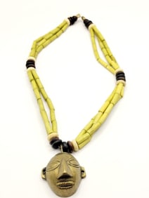 BRASS TRIBAL MASK VINTAGE PENDANT ON CLAY/RESIN BEADED NECKLACE