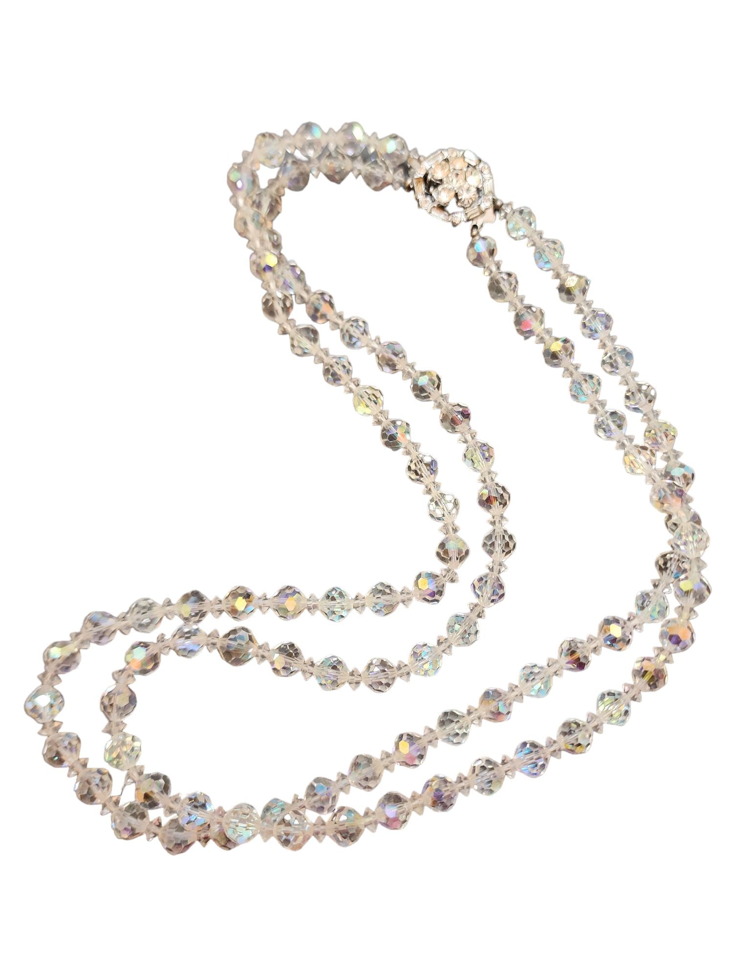 VINTAGE DOUBLE STRAND CUT CRYSTAL NECKLACE: Vintage Double Strand Cut Crystal Necklace (A5073) Size: 22" Color: Clear Condition: Very good vintage Signed: None Details: A few stones are missing from rhinestone clasp.