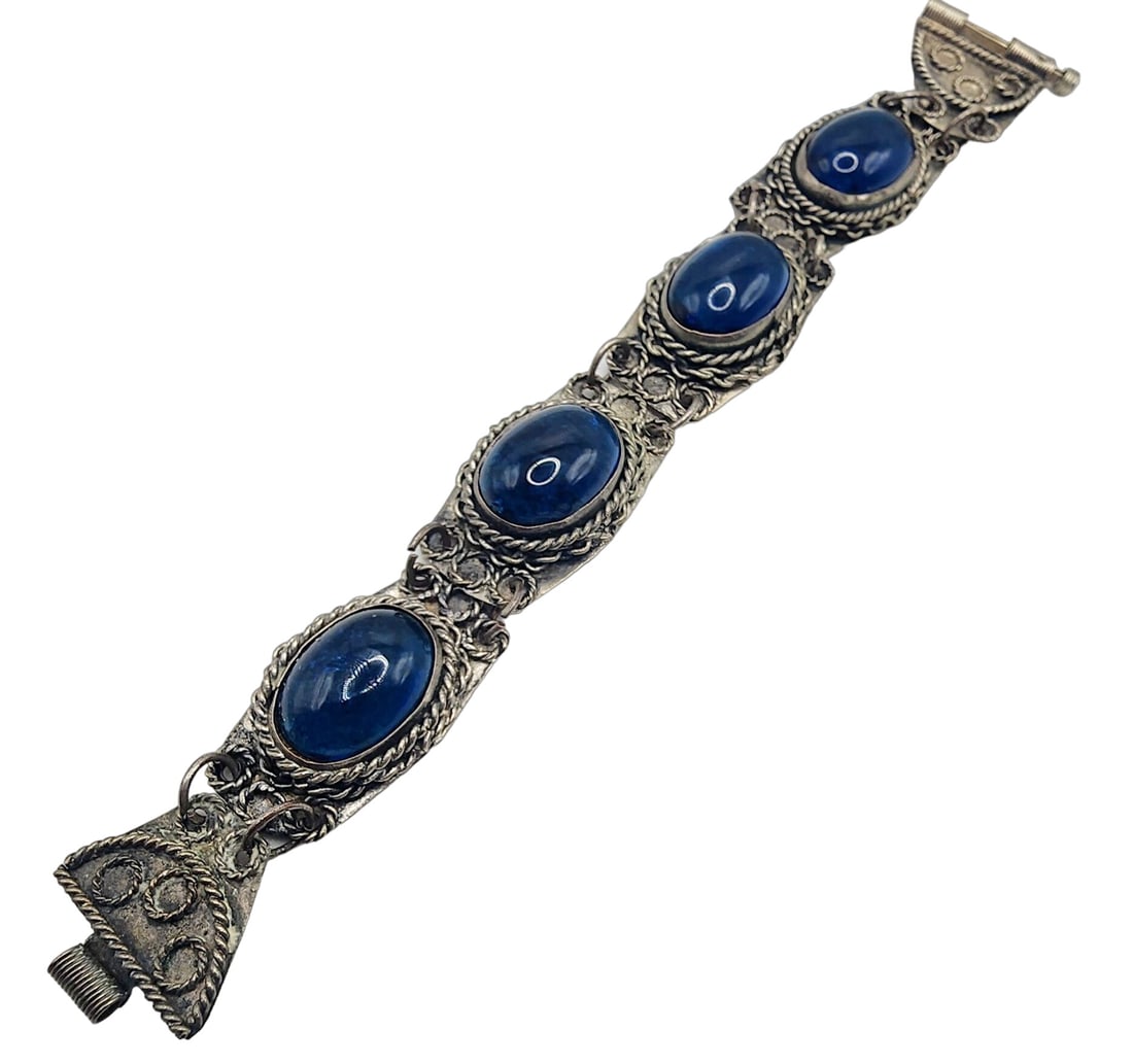 VINTAGE TURKEY GLASS BRACELET: Vintage Turkey Glass Bracelet (A5086) Size: almost 7" Color: Blue, silver Condition: Very good vintage Signed: None Details: Glass and metal bracelet from Turkey