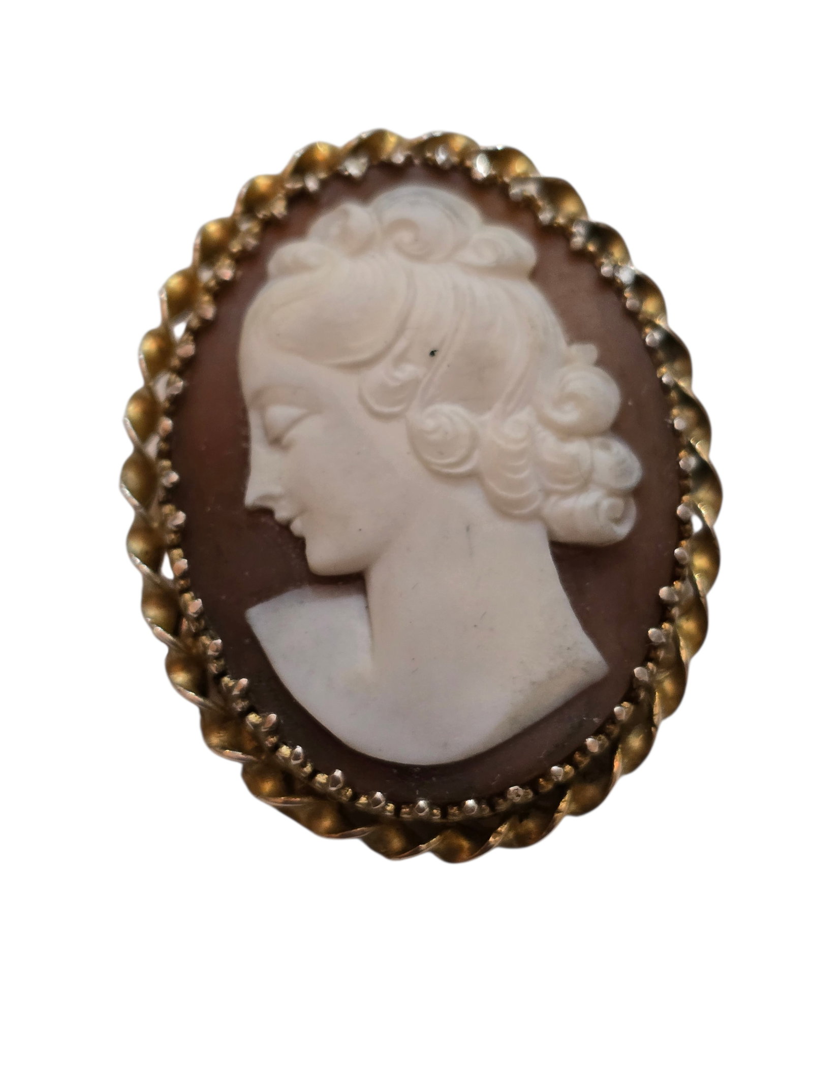 ANTIQUE SARDONYX AND GOLD FILLED LEFT FACING CAMEO BROOCH PENDANT: ANTIQUE SARDONYX AND GOLD FILLED LEFT FACING CAMEO BROOCH PENDANT. MEASURES 1.5", IN VERY GOOD CONDITION. BEAUTIFUL CARVING TWISTED OUTER BEZEL. FANCY BEZEL AROUND CAMEO.