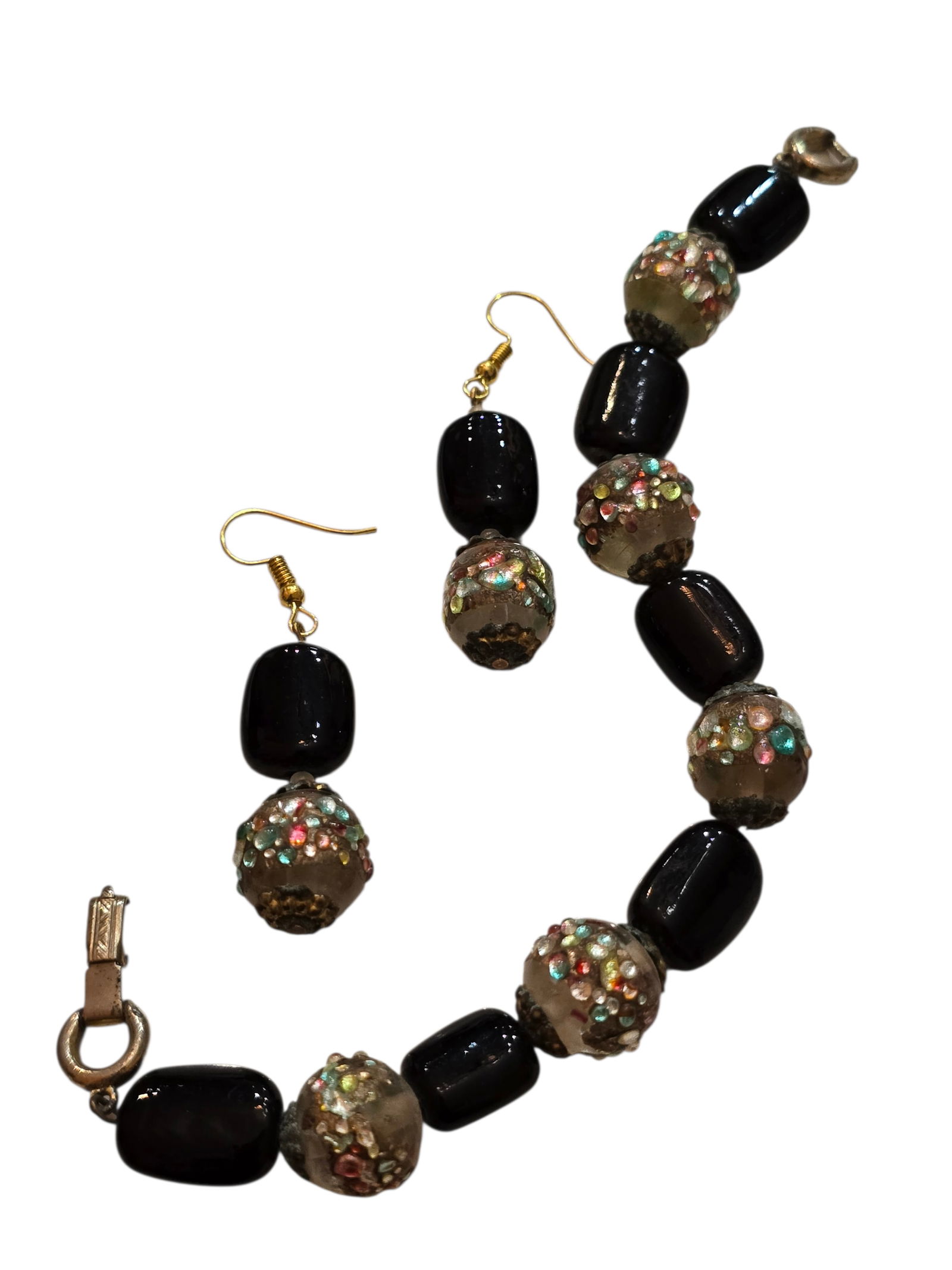 VINTAGE ALL GLASS UNIQUE BEADED BRACELET SET: VINTAGE ALL GLASS UNIQUE BEADED BRACELET SET. IN VERY GOOD CONDITION, INTERESTING CLEAR GLASS BEADS AND OVERLAPPING DESIGN. BRACELET 8.25" AND 2.25" EAR PIERCED.