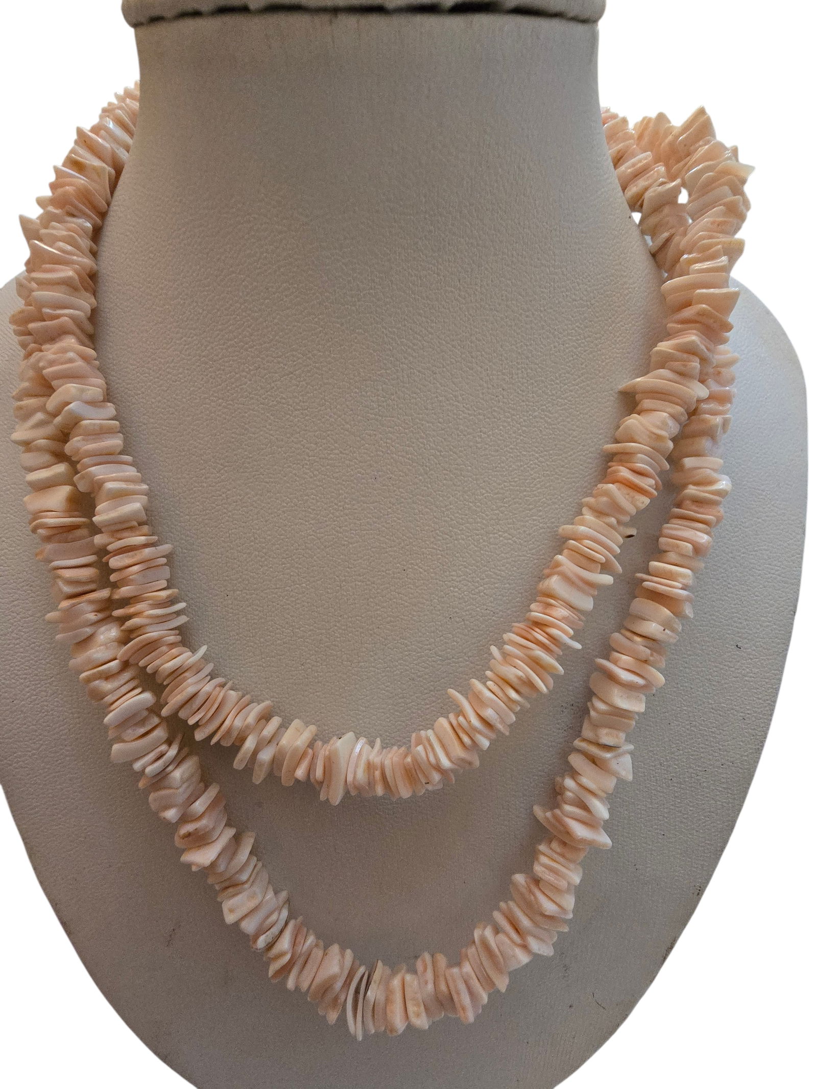 VINTAGE 70S LONG PUKA SHELL BEADED NECKLACE: VINTAGE 70S LONG PUKA SHELL BEADED NECKLACE. 30" CURVED TO NECK. IN GOOD CONDITION, BARREL CLASP.