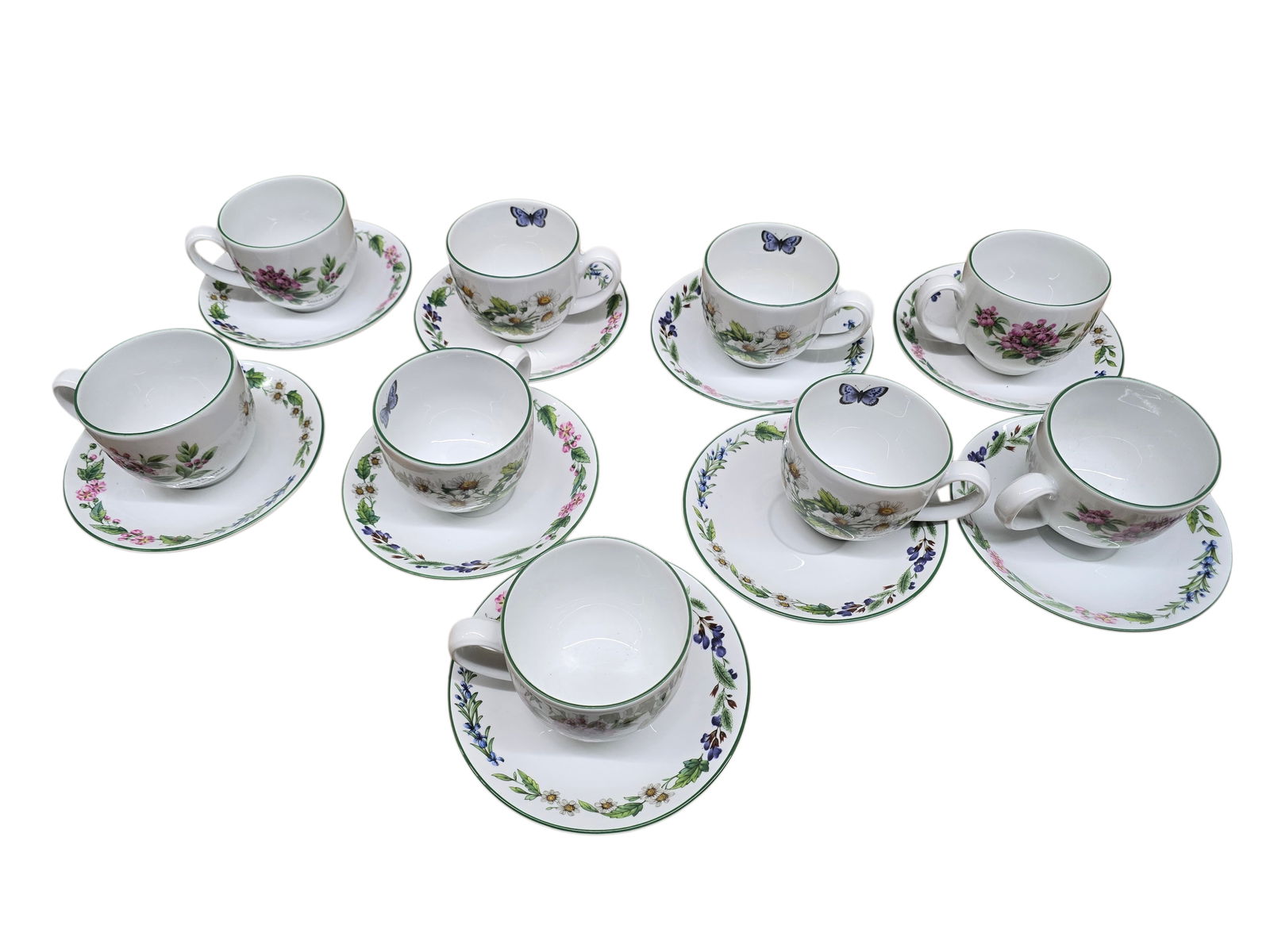 VINTAGE WORCESTER HERBS ENGLAND SET OF 9 BOTANICAL CUPS AND SAUCERS: VINTAGE WORCESTER HERBS ENGLAND SET OF 9 BOTANICAL CUPS AND SAUCERS. IN VERY GOOD CONDITION, ALL SIGNED. 2 DIFFERENT FLOWERS EACH SIDE.