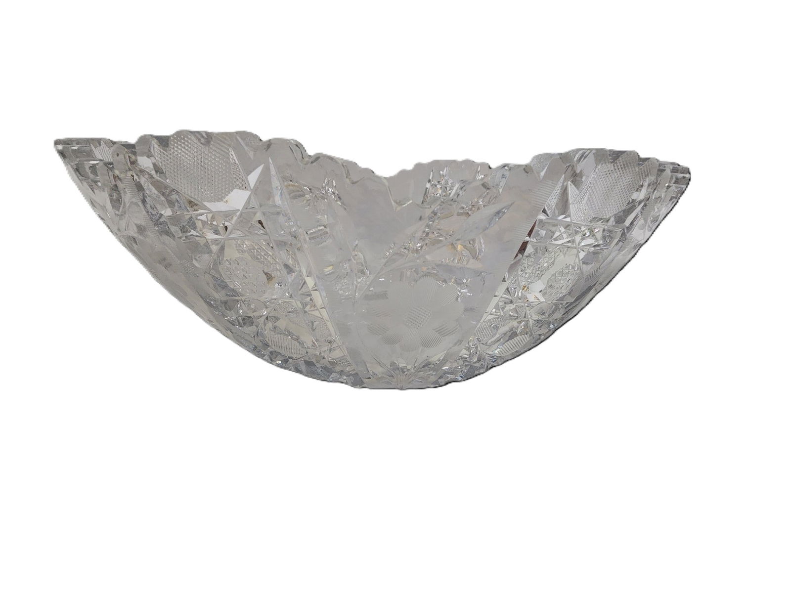 ANTIQUE LEADED CUT CRYSTAL STUNNING BOWL WITH A FLOWER ON THE BOTTOM BOWL: ANTIQUE LEADED CUT CRYSTAL STUNNING BOWL WITH A FLOWER ON THE BOTTOM BOWL, VERY HEAVY, 11" X 5"