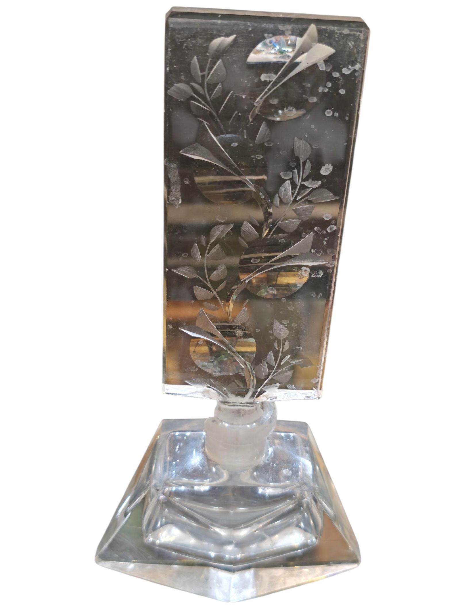 VINTAGE DECORATIVE GLASS PERFUME BOTTLE *AS IS*: VINTAGE DECORATIVE GLASS PERFUME BOTTLE *AS IS*, 7". NEEDS A GOOD CLEANING. TOP OF THE BOTTLE HAS A BIG CHIP AT THE NECK OF THE BOTTLE. These are all clearIt's just the reflection making the tops look