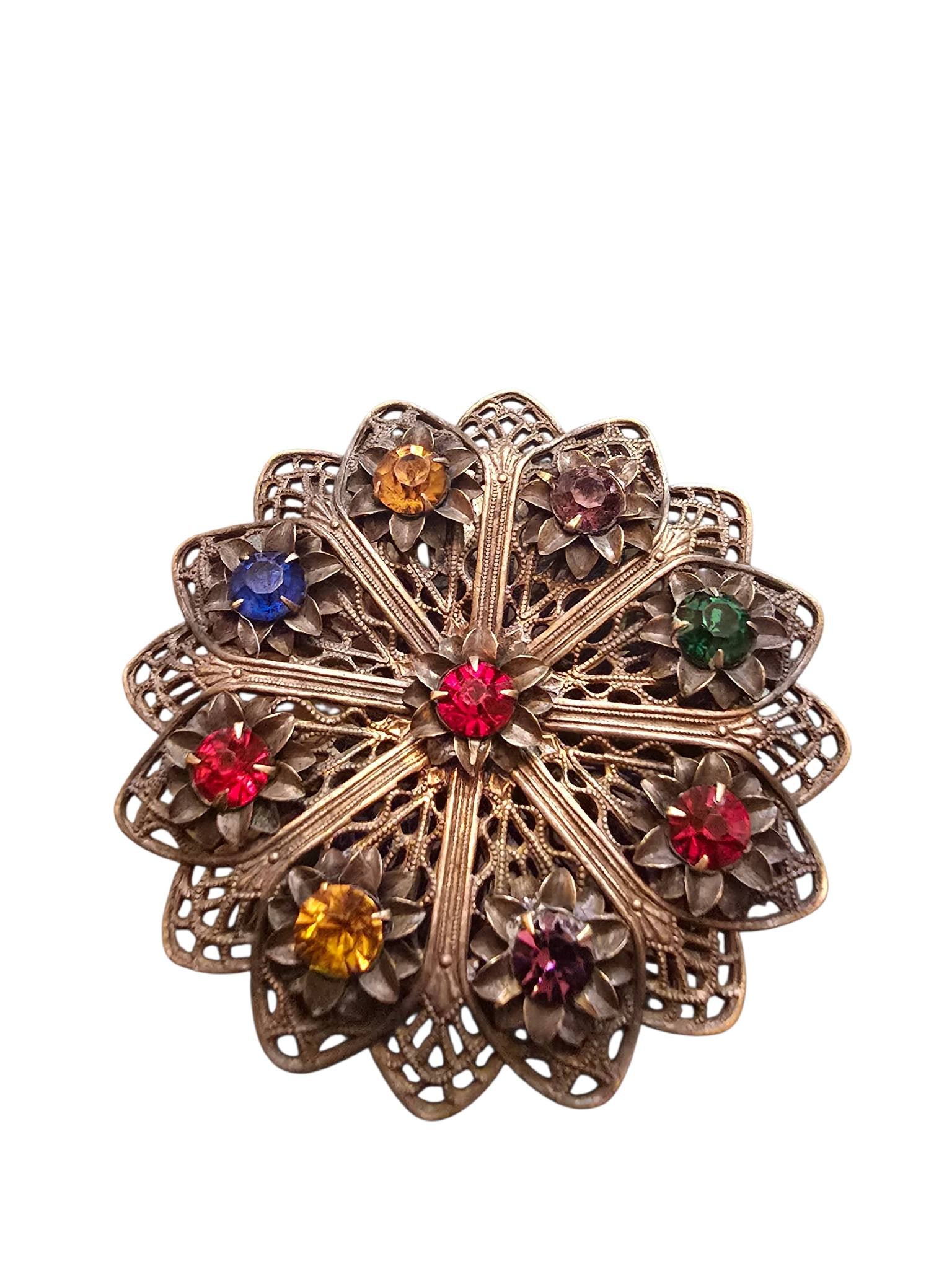 BRASS CZECH MULTI COLOR FILIGREE FLOWER BROOCH: BRASS CZECH MULTI COLOR FILIGREE FLOWER BROOCH. 2", NICE PATINA TO THE BRASS, C - CLASP CLOSURE