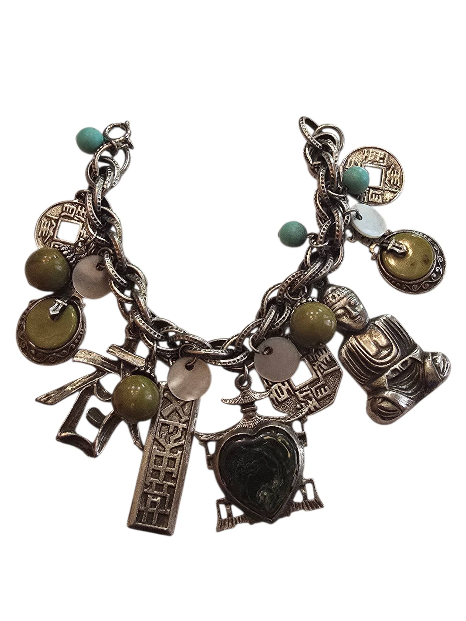 ASIAN MOTIF LOADED CHARM BRACELET ATTRIBUTED TO ART- ARTHUR PEPPER: ASIAN MOTIF LOADED CHARM BRACELET ATTRIBUTED TO ART- ARTHUR PEPPER . THIS IS UNMARKED, MOST DEFINITELY ART, AS USUALLY THE EARRINGS ARE SIGNED. I HAVE HAD THIS BEFORE IN YELLOW AND RED. MOST OF THE CH