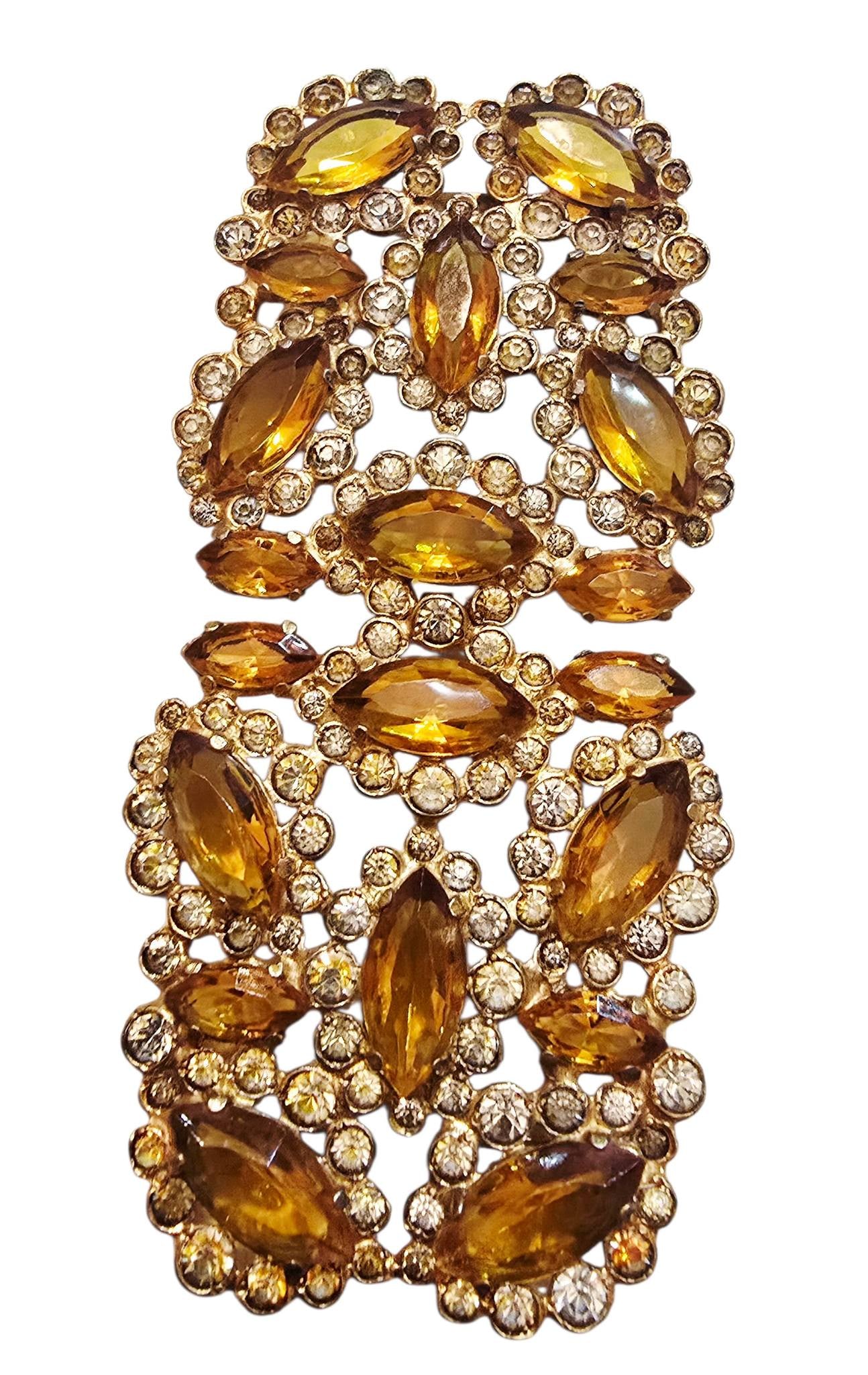 ANTIQUE GLASS BUCKLE: ANTIQUE GLASS BUCKLE. 3.75", ALL STONES ARE THERE, SOME HAVE DARKENED, ITS A HEAVY ONE