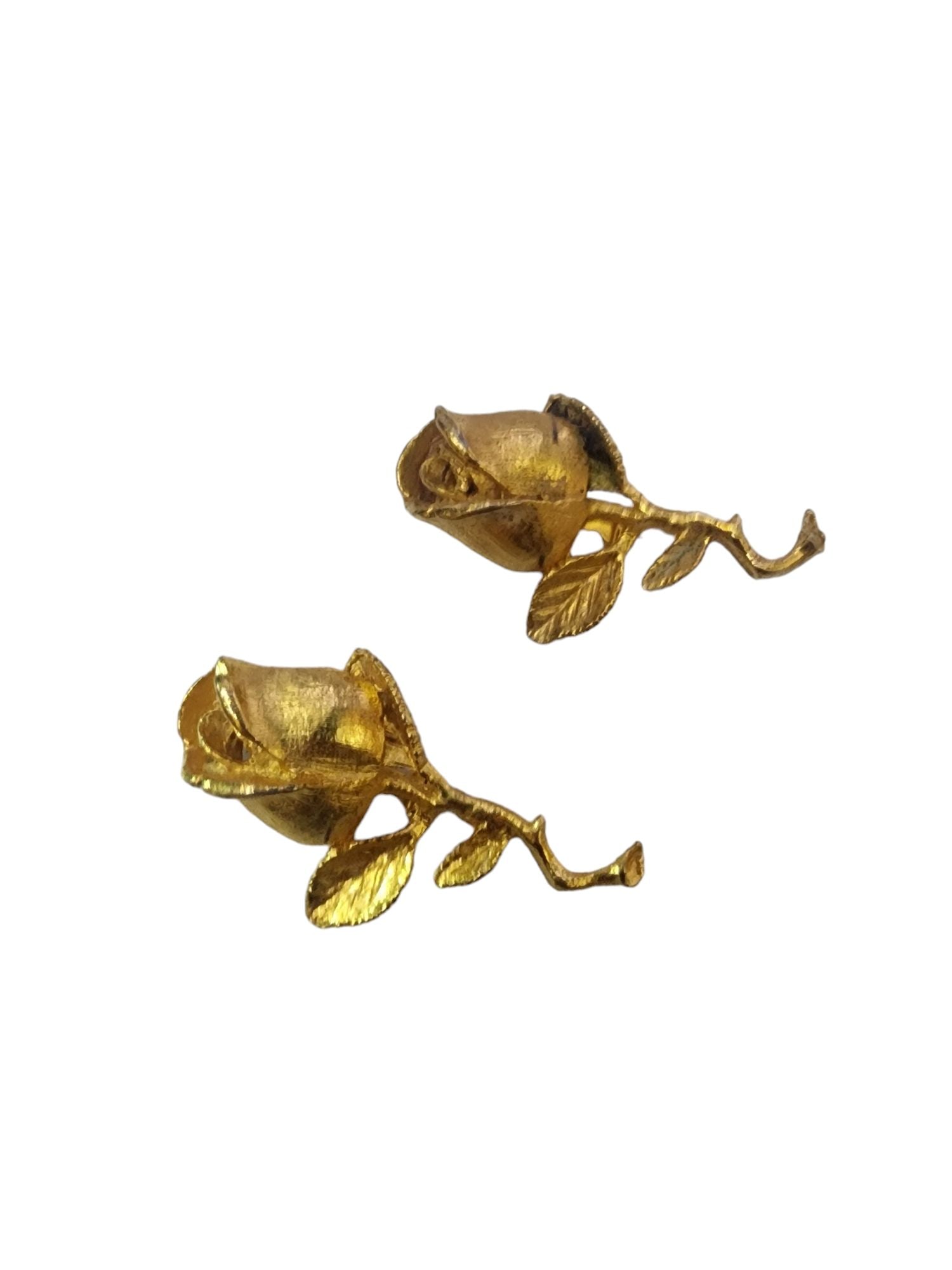 PAIR OF DFA VINTAGE FLOWER BROOCHES: Pair Of DFA Vintage Flower Brooches. 2". These DFA vintage brooches feature an elegant gold-tone rose design with intricate leaf accents. A charming accessory with timeless antique appeal.