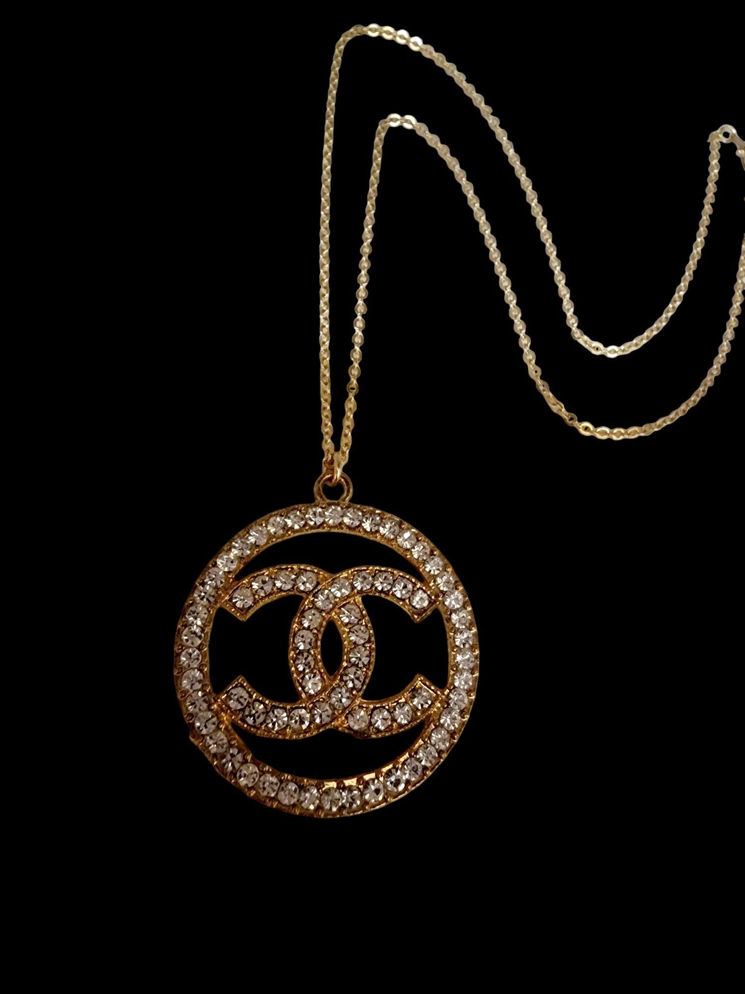 FAUX DOUBLE CC RHINESTONE NECKLACE: Faux Double Cc Rhinestone Necklace. 20". Not the real deal ,nicely made