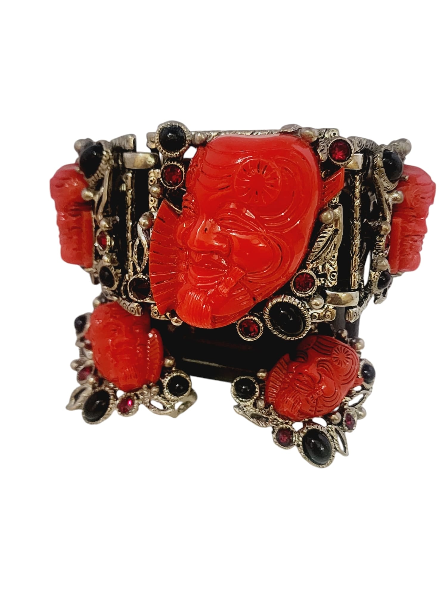 SIGNED SELRO NOA MASK BRACELET AND EARRINGS SET: Signed Selro Noa Mask Bracelet and Earrings Set. Bracelet is 7", clips which could use tighting, 1.5" In nice condition, all pieces are signed. The bracelet has 2 stones on each end that are not glass