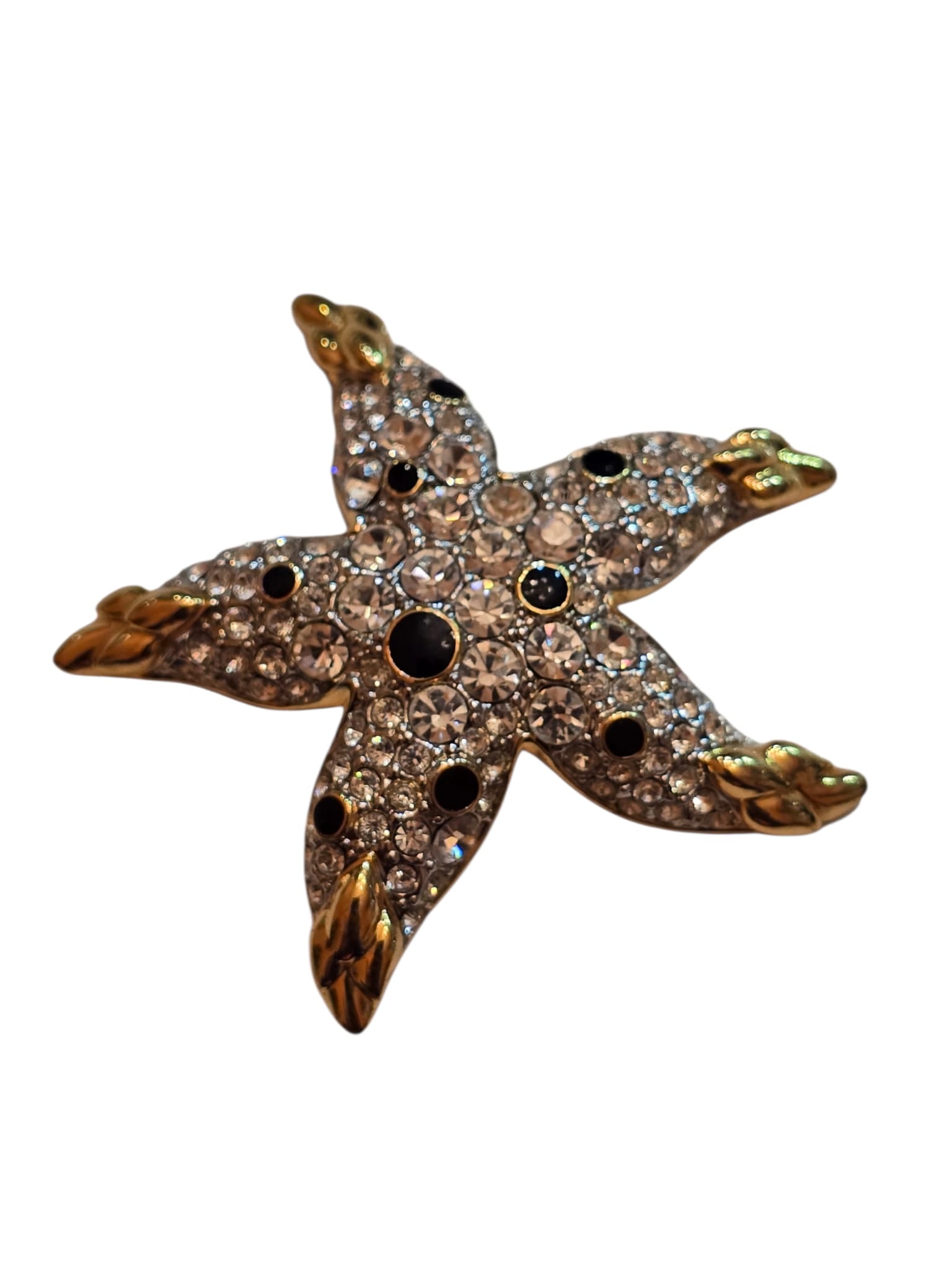 VINTAGE UNSIGNED 80S PAVE RHINESTONE STYLIZED STAR BROOCH: VINTAGE UNSIGNED 80S PAVE RHINESTONE STYLIZED STAR BROOCH. 2", IN VERY GOOD CONDITION. VERY WELL MADE.