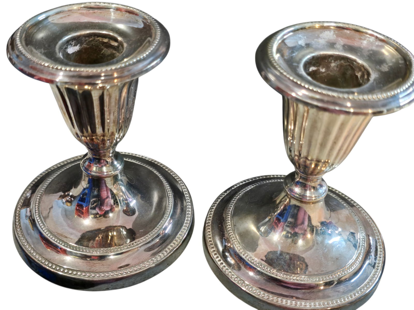 PAIR OF VINTAGE SILVER PLATE CANDLE STICK: PAIR OF VINTAGE SILVER PLATE CANDLE STICK. APPROX 4.5". FELT BOTTOM.