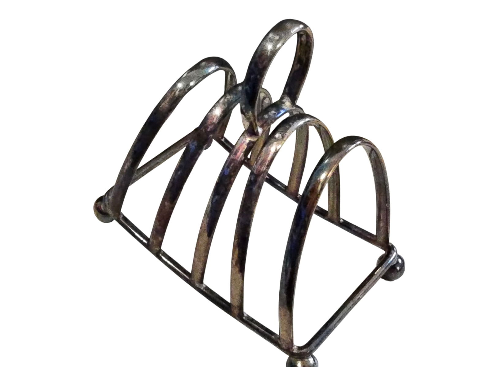 VINTAGE SILVERPLATE MARKED TOAST RACK: VINTAGE SILVERPLATE MARKED TOAST RACK. 4" x 4". ROOM FOR 4 SLICES. MARKED BUT HARD TO READ.