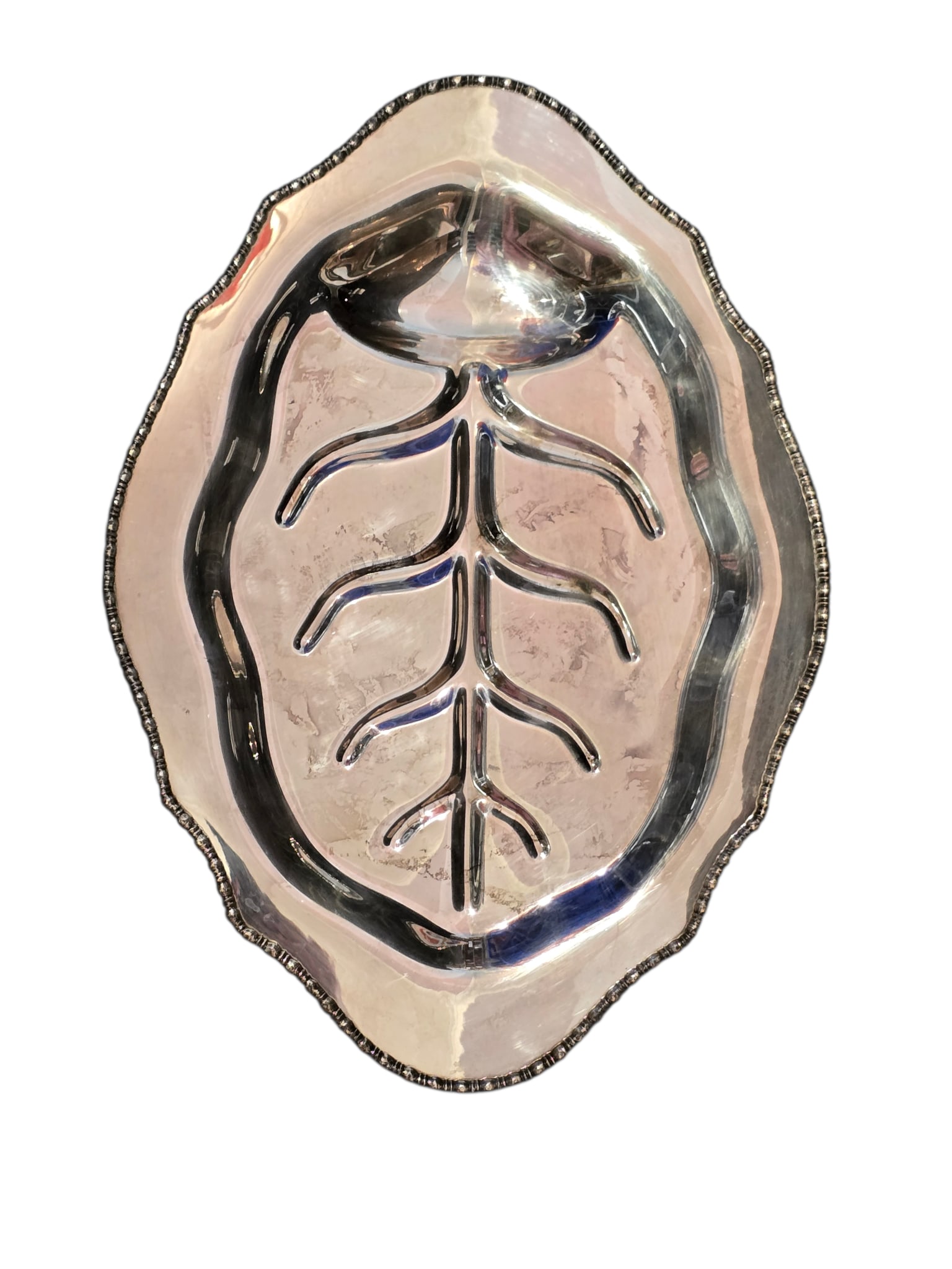 VINTAGE SILVER PLATE FOOTED MEAT PLATTER: VINTAGE SILVER PLATE FOOTED MEAT PLATTER. APPROX. 18" x 12". NOT MARKED. THERE ARE SOME SCRATCHES.