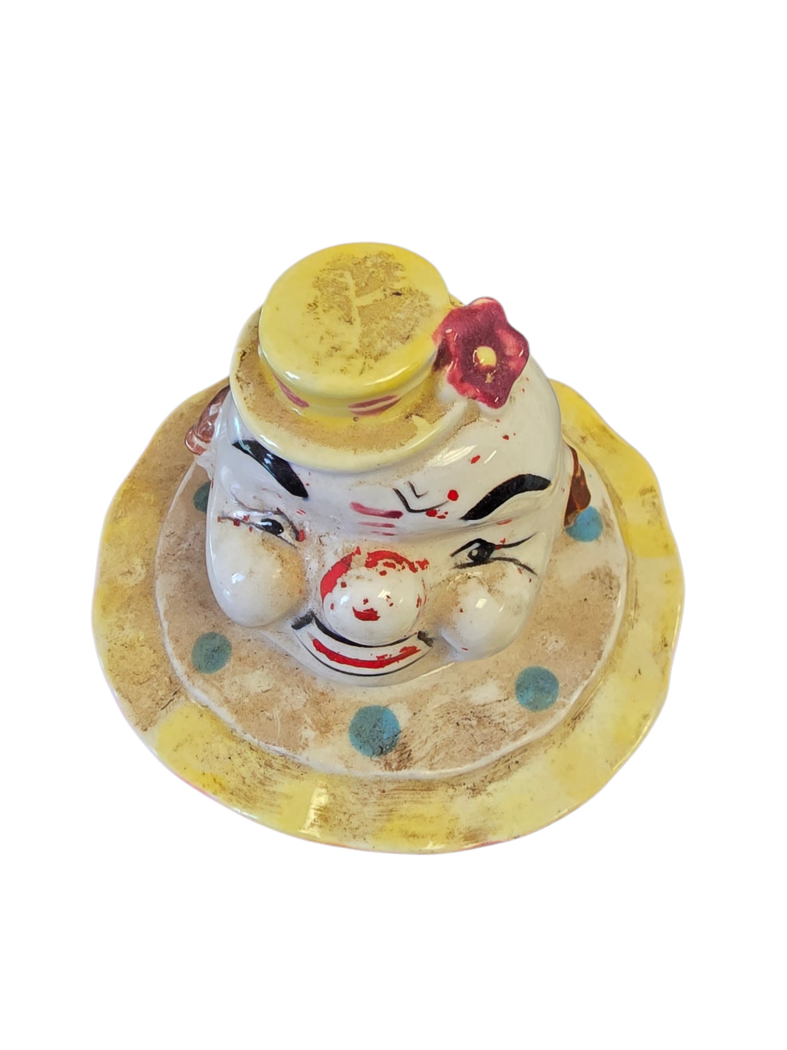 VINTAGE PORCELAIN CLOWN TOP FROM A COOKIE JAR: VINTAGE PORCELAIN CLOWN TOP FROM A COOKIE JAR. 3.25". IN GOOD CONDITION, NEEDS CLEANING.