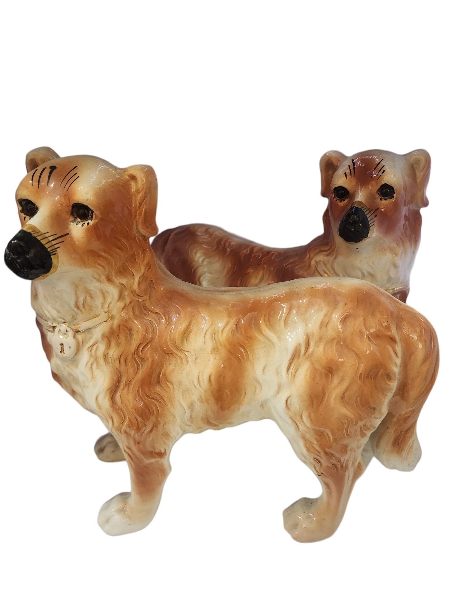 PAIR OF VINTAGE STAFFORDSHIRE DOG STATUES: PAIR OF VINTAGE STAFFORDSHIRE DOG STATUES. MOST PROBABLY MADE IN ENGLAND, ABSOLUTELY WONDERFUL, 12" BY 11" BY 5".1 DOG HAS 1 LEG THAT IS CRACKED, BUT STILL TOGETHER.
