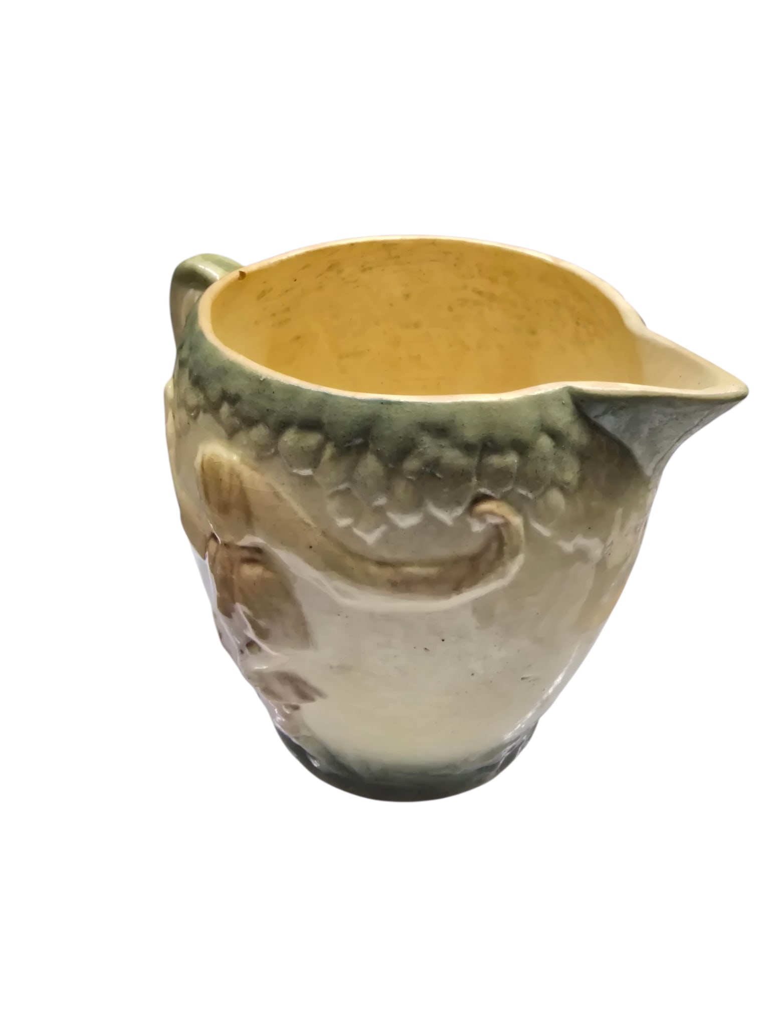 ANTIQUE EARLY ROSEVILLE PRE 1916 "THE BOY" POTTERY PITCHER: ANTIQUE EARLY ROSEVILLE PRE 1916 "THE BOY" POTTERY PITCHER. APPROX 8" x 6" TO HANDLE. LOTS OF GRAZING. EMBOSSED 3D BOY AND LEAVES.