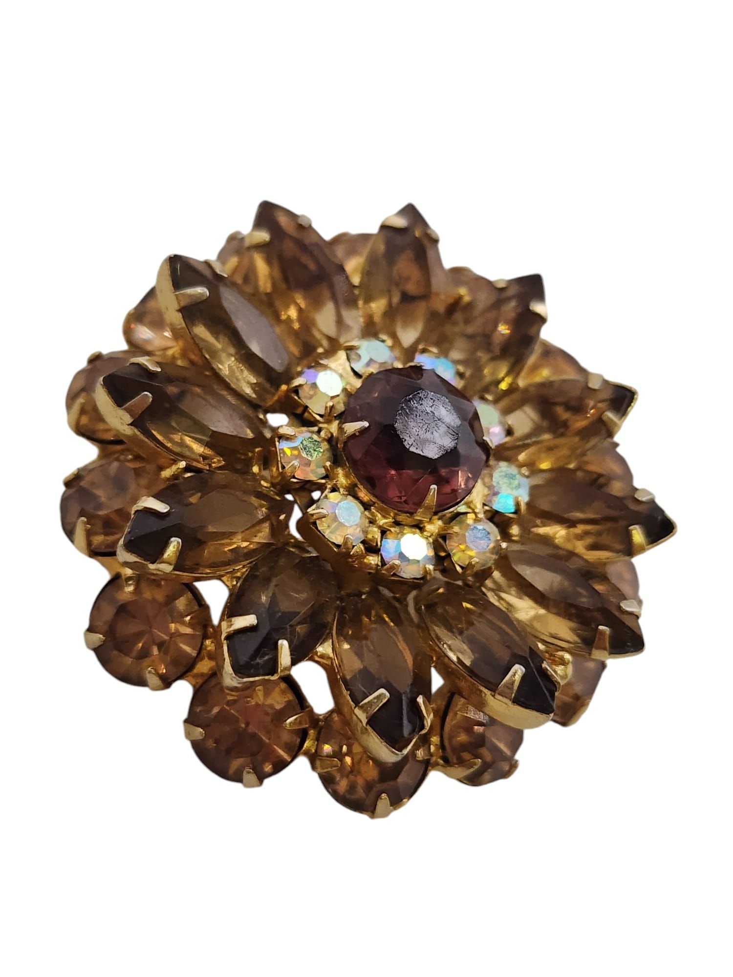 VINTAGE BLINGY MULTI TONE TOPAZ RHINESTONE DIMENSIONAL BROOCH: Vintage Blingy Multi tone Topaz Rhinestone Dimensional brooch (A5680)Size: 2"Color: Gold, champagne, purpleCondition: Very good vintageSigned: NoneDetails: Nice stones! Topaz, champagne, ab clear and