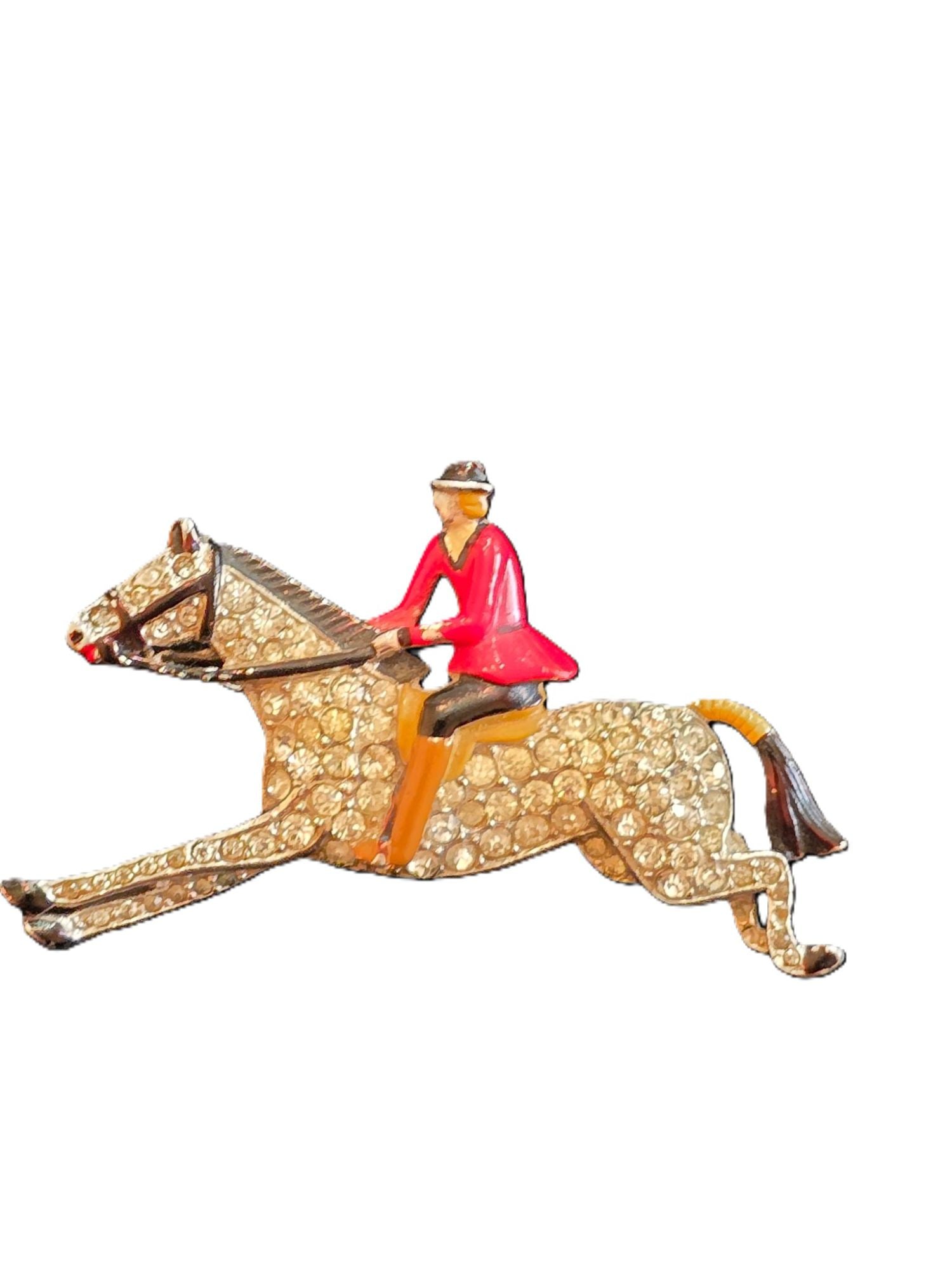 Exceptional Early Signed Trifari Pave Horse With Enamel Rider Brooch: Exceptional Early Signed Trifari Pave Horse With Enamel Rider Brooch (A9709) Size: approx. 1.75" by 1" Color: Red, Silver Condition: Very Good Condition Signed: Trifari Details: These are rare and in 