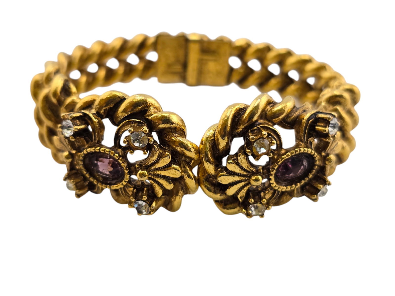 Florenza Heavy Twisted Metal and Glass Clamper Bracelet: Florenza Heavy Twisted Metal and Glass Clamper Bracelet. Signed. This is a heavy-quality and well-made bracelet. 2 purple stones are set inside the bezel and slightly lower than the bezel. Stones and 