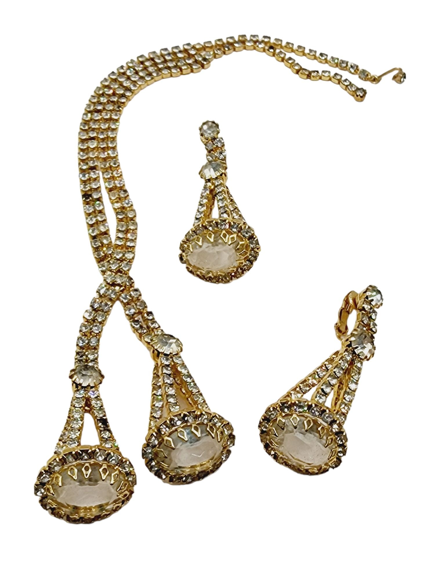 Vintage Spectacular Unsigned Designer Quality Rhinestone Set (A1225): Vintage Spectacular Unsigned Designer Quality Rhinestone Set. Necklace 15" with 3" drop. Earrings 2.5". Color: Gold, clear. Condition: Very good vintage; there are a few grayish small stones. Signed: 