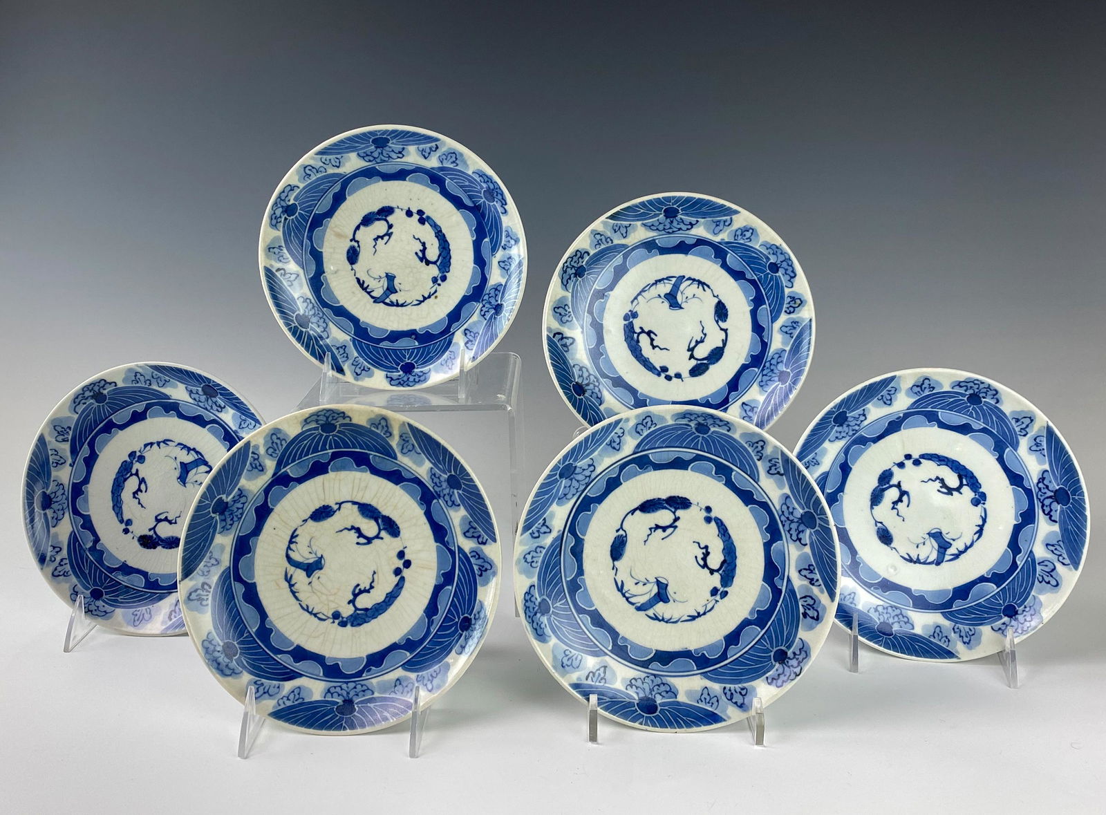 Chinese Antique Blue Porcelain 7" Plates SET OF 6: Designed with floral forms and cloud patterns in blue, against a white ground. Trailing vine design to back with encircling double ring. Good estate fresh condition. Shallow nick to rim on one. Few wi