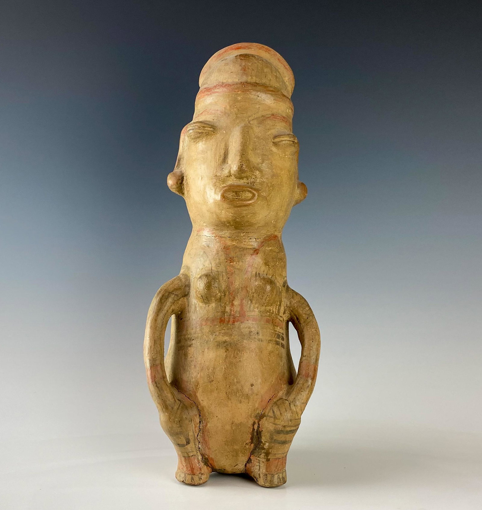 Pre Columbian Maya Style 6" Red Clay Mud Sculpture: Pre Columbian style form with remnants of polychrome decoration. Origin unknown. Fair estate fresh condition. Multiple areas having hairline cracking. Measures 17 1/2 in. x 6 1/2 in. x 6 in. MMB Inc. 