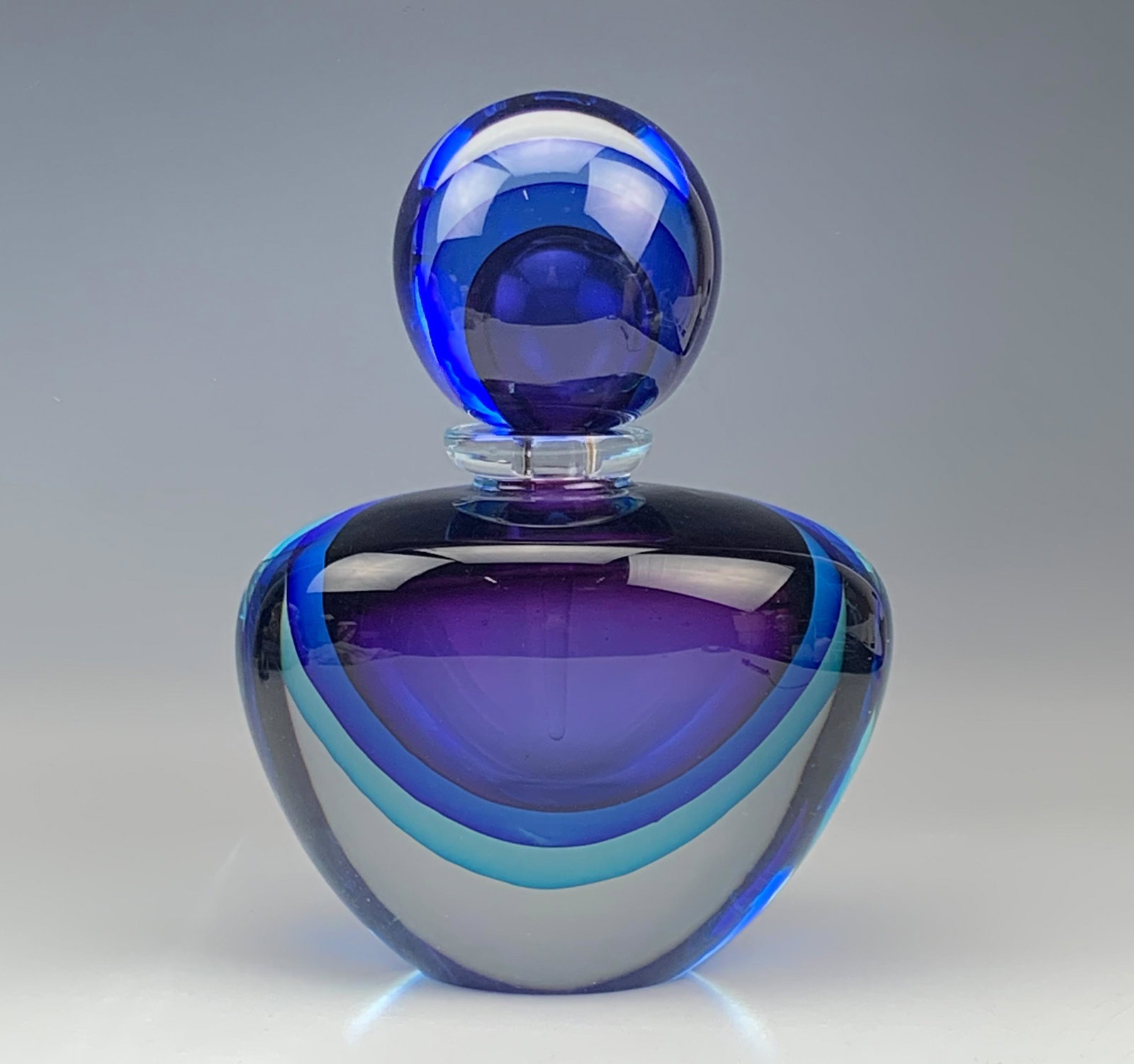 Murano Sommerso Cased Glass Scent Perfume Bottle: Generously large and HEAVY in manner. In the style of Oball / Luigi Onesto ( Italian, b.1935) Circa 1970's. Of warm nature inspired form with rounded glass stopper and clear pointed dauber wand and he