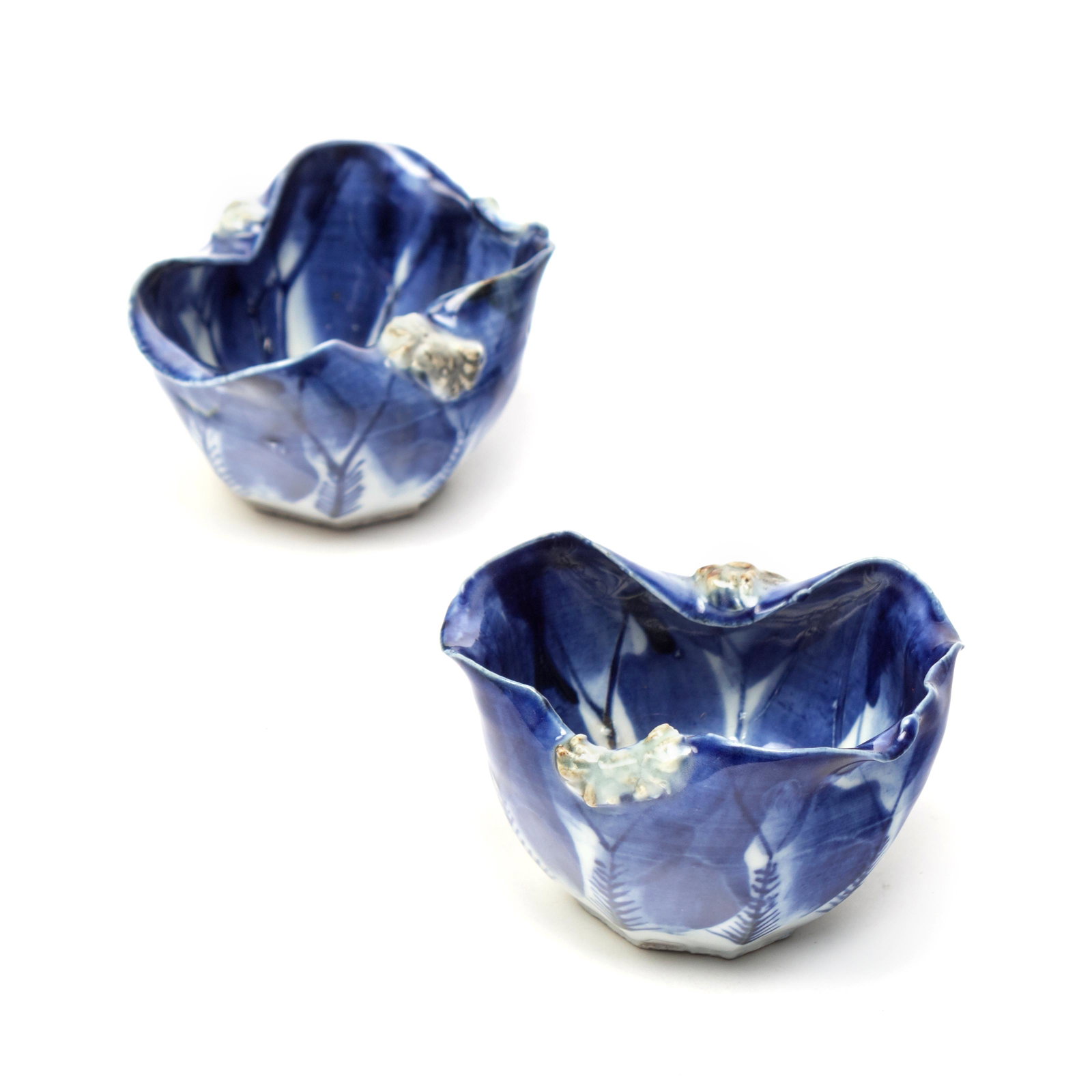 Japanese Blue White Art Pottery Flower Cups PAIR: Pair small Japanese blue white flower bowls with imprinted makers mark on underside. Good condition with normal surface wear. Measures 2 in. x 3 in. (each). Estate fresh to the market. MMB In house co
