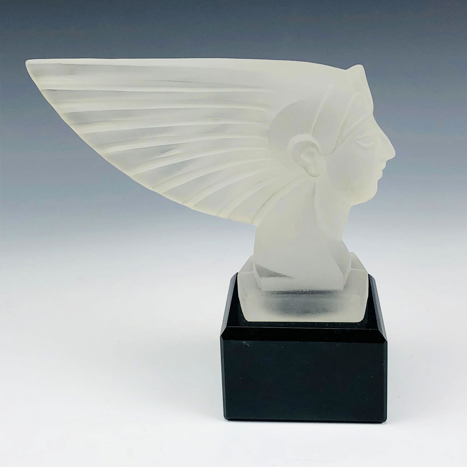 Art Deco Frosted Glass Car Mascot Hood Ornament: High quality satin finish glass sculpture car hood ornament. Modeled with a strongly influenced Art Deco approach. Features the head of an Egyptian wearing an elaborate head dress. Originally modeled