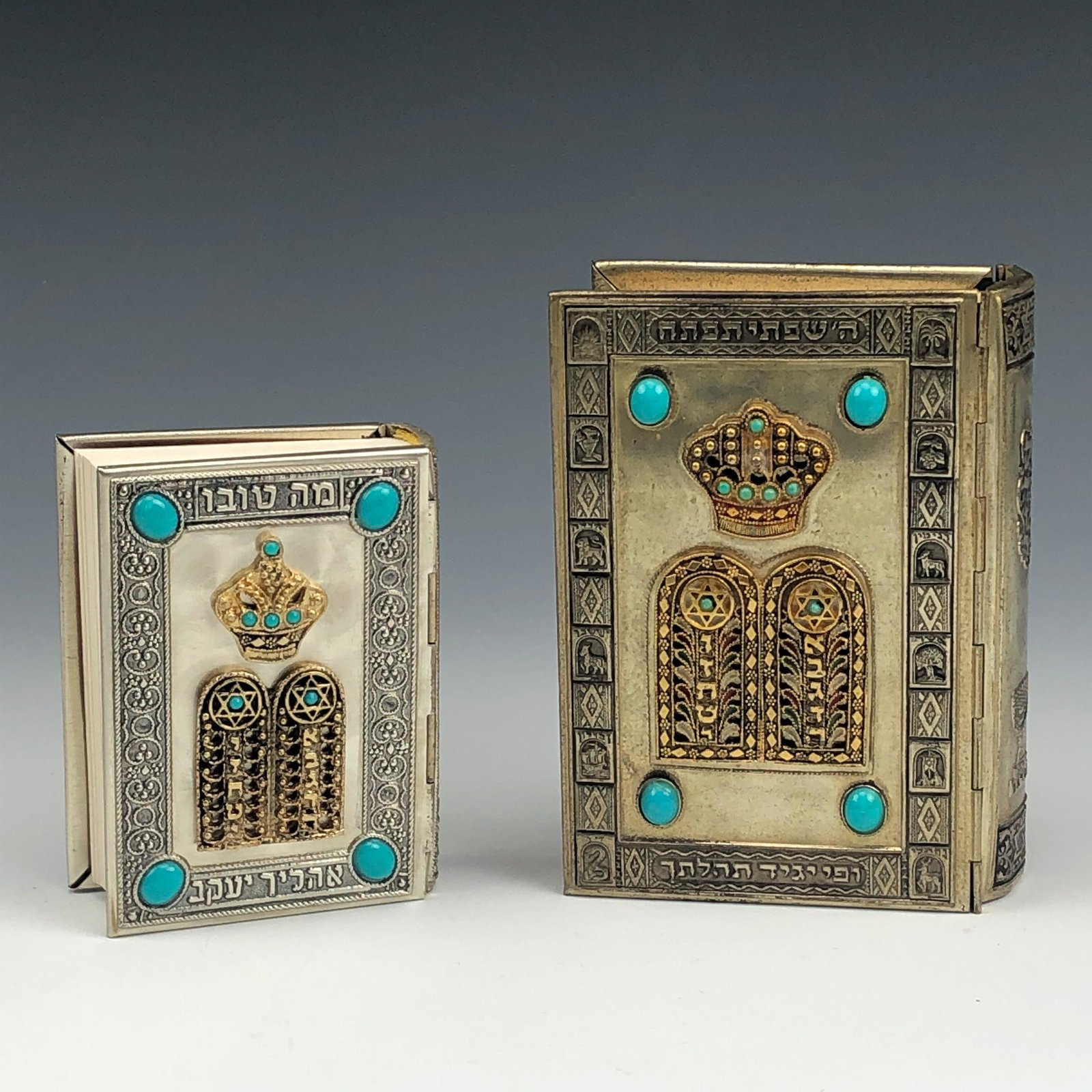Lot 2 Jewish Judaica Israel Bejeweled Prayer Books: Lot 2 Jewish Judaica Israel Avodat Siddur Prayer Books. The metal silver toned covers graced with oval blue cabochons, raised gilt brass 10 commandments and a crown on one side, the opposite side with