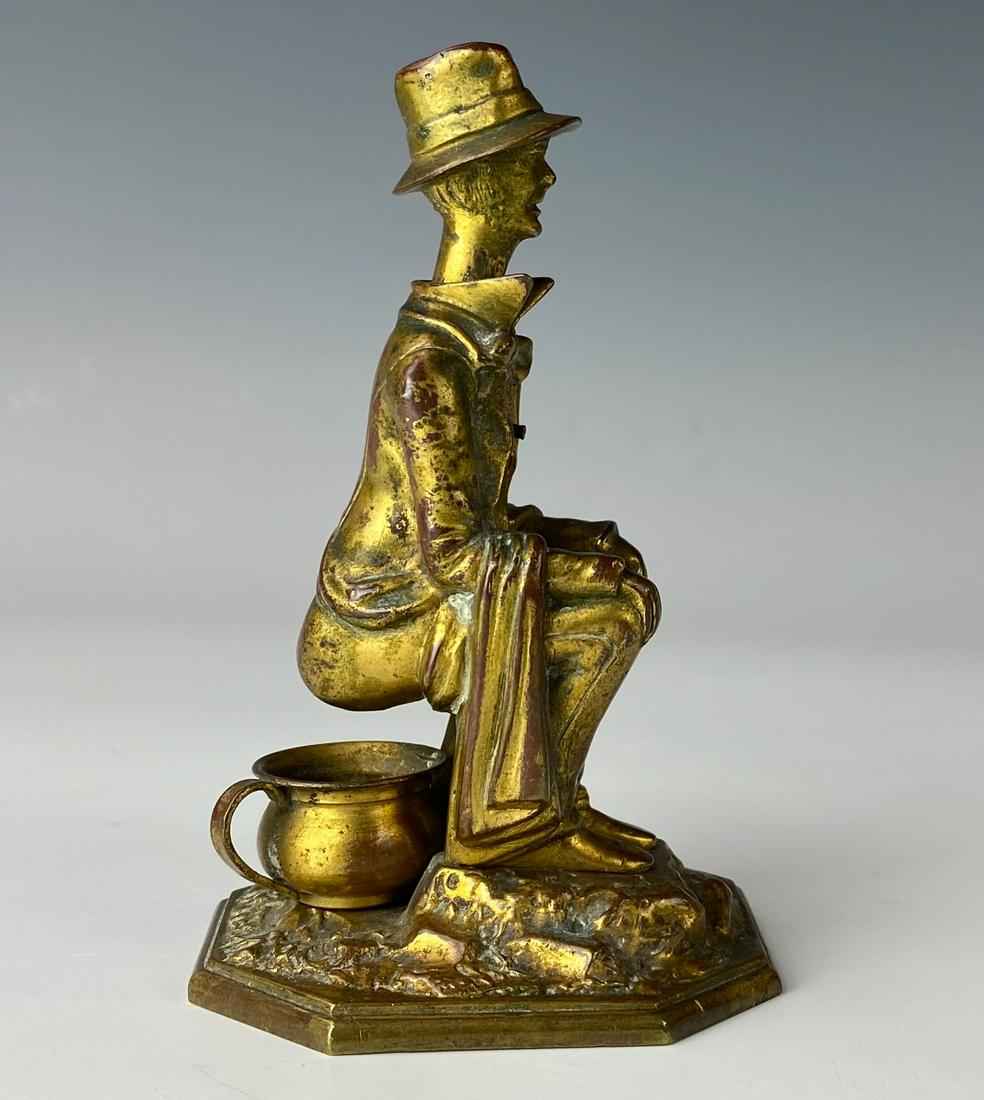Antique Bronze Man on Chamber Pot Cigar Cutter