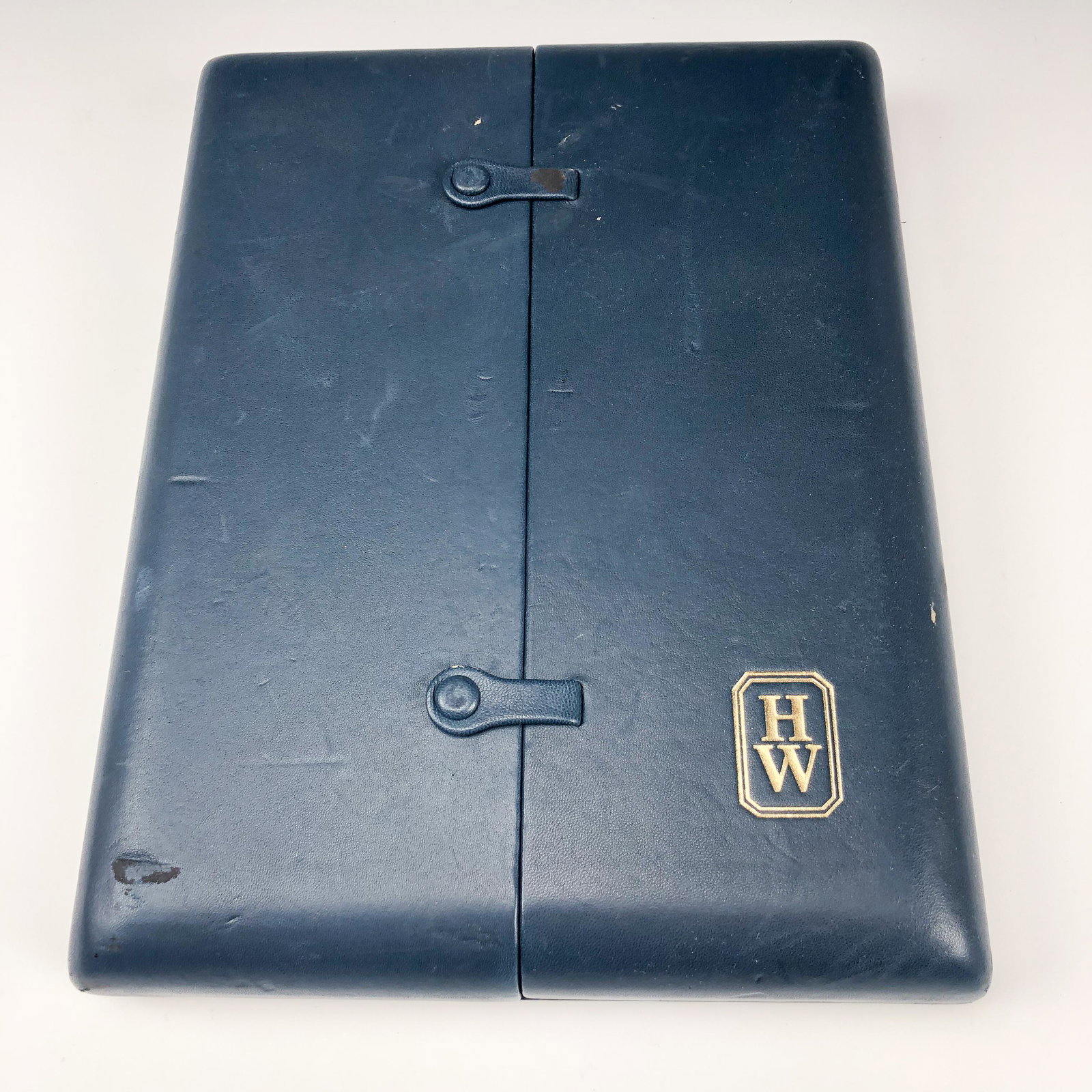 Harry Winston Leather Presentation Jewelry Box: Harry Winston Blue Leather Earrings Necklace Jewelry Presentation Box. Interior with a velvet lining. Preowned. Signed HW in double octagonal form. Same stamp seen on the inside, the words Harry Winst