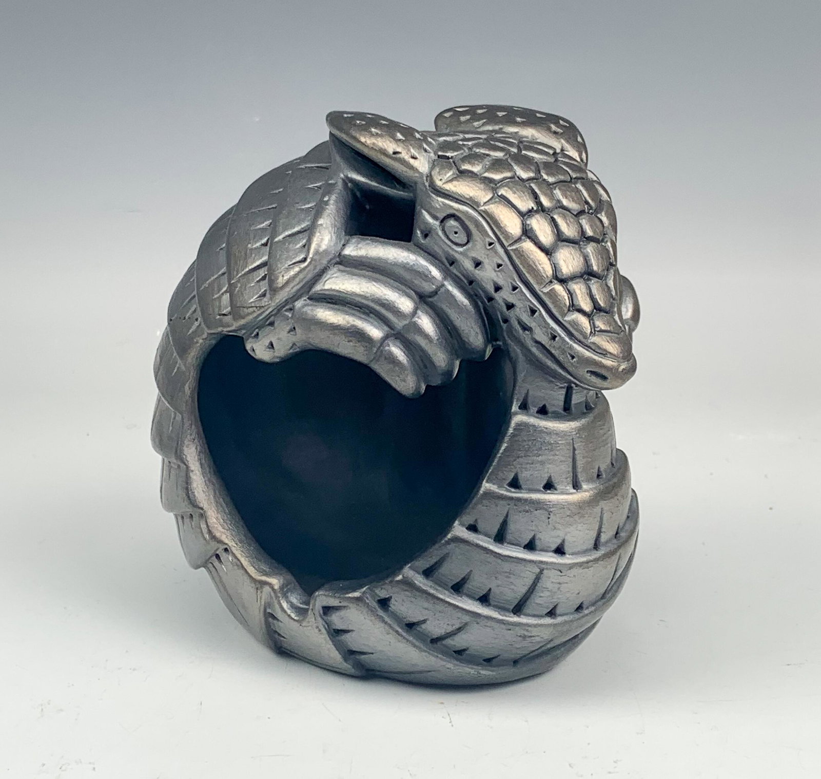San Carlos Salta Armadillo Black Pottery Sculpture: Neat depiction of an Armadillo mammal by Argentinean sculpture, Eduardo Mendoza. Modeled in the small town of San Carlos, province of Salt, Argentina. These intricately carved ceramic pottery articles