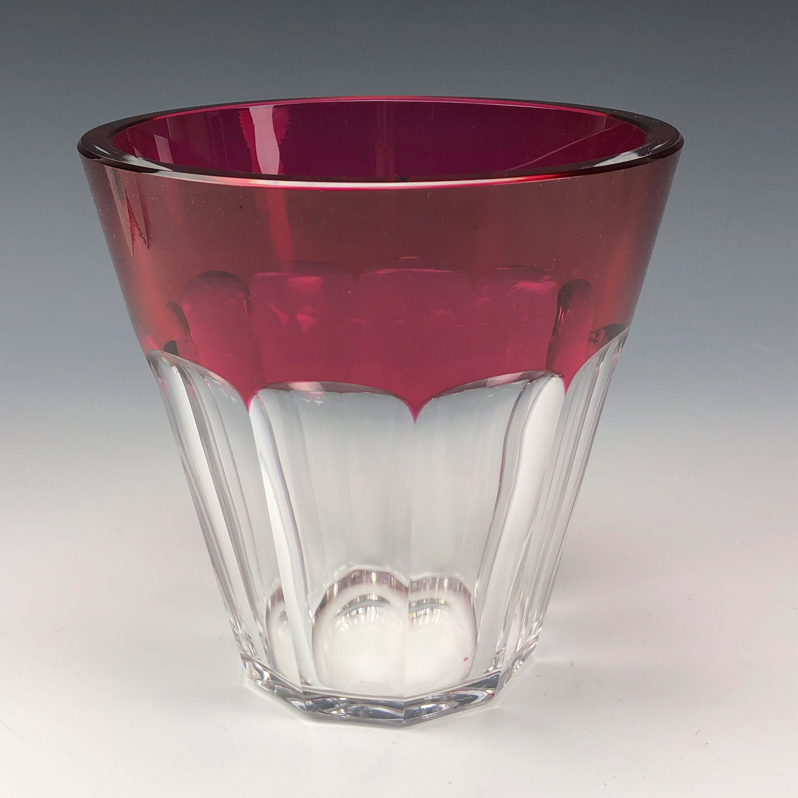 Val St Lambert Cranberry & Clear 6" Panel Cut Vase: Features a solid thick walled Belgium crystal art glass vase modeled by Val St. Lambert. Classic cranberry colored top, the tapered body with10 cut concave panels around. Smooth high mirror polished b