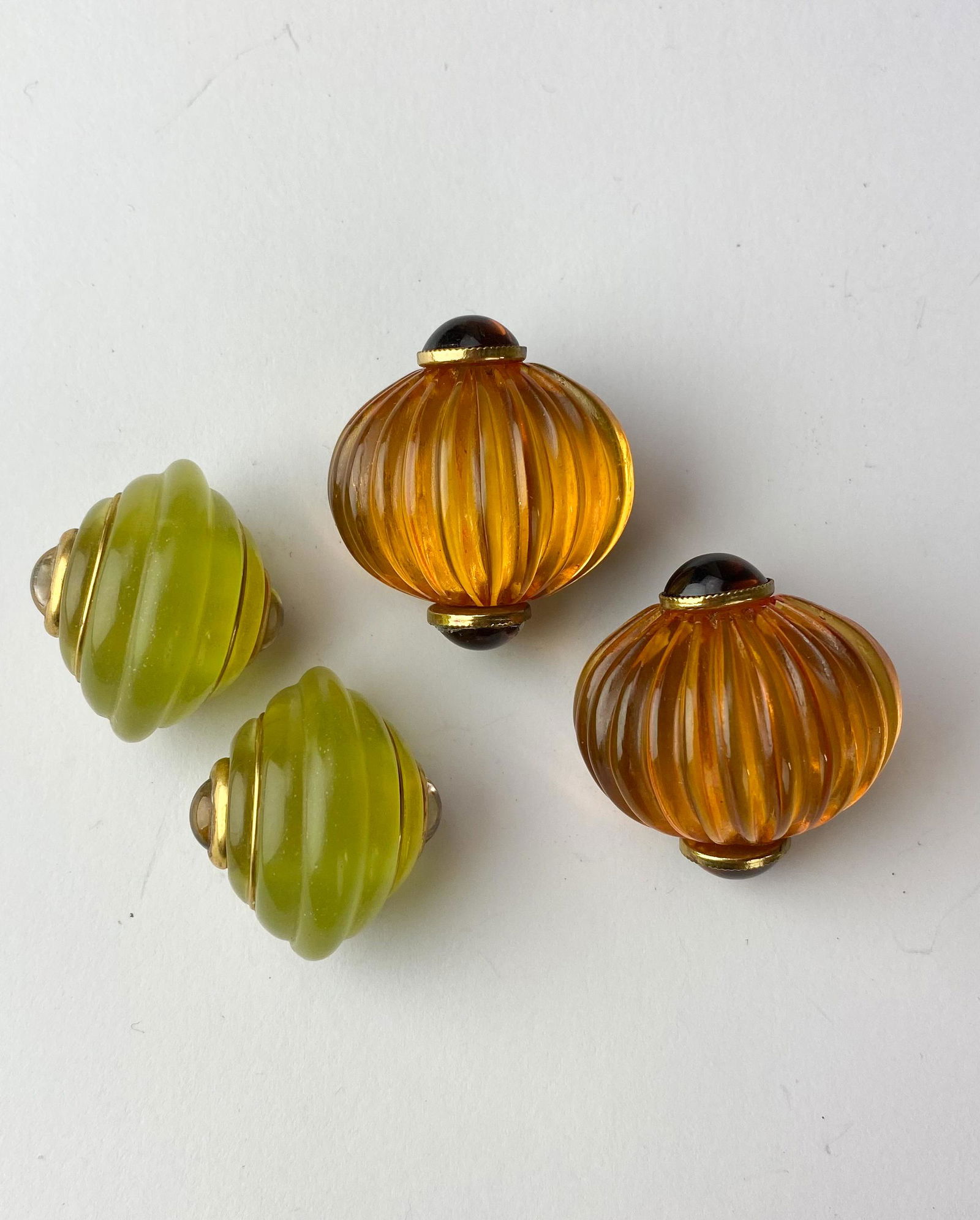 2 Pairs Fabrice Paris Carved Lucite Clip Earrings: Included are 2 fine pairs of 1980's runway Fabrice Paris hand carved lucite shell style clip on earrings. All original patina weathered through time, left intact. NO box. Signed Fabrice Paris. Estate