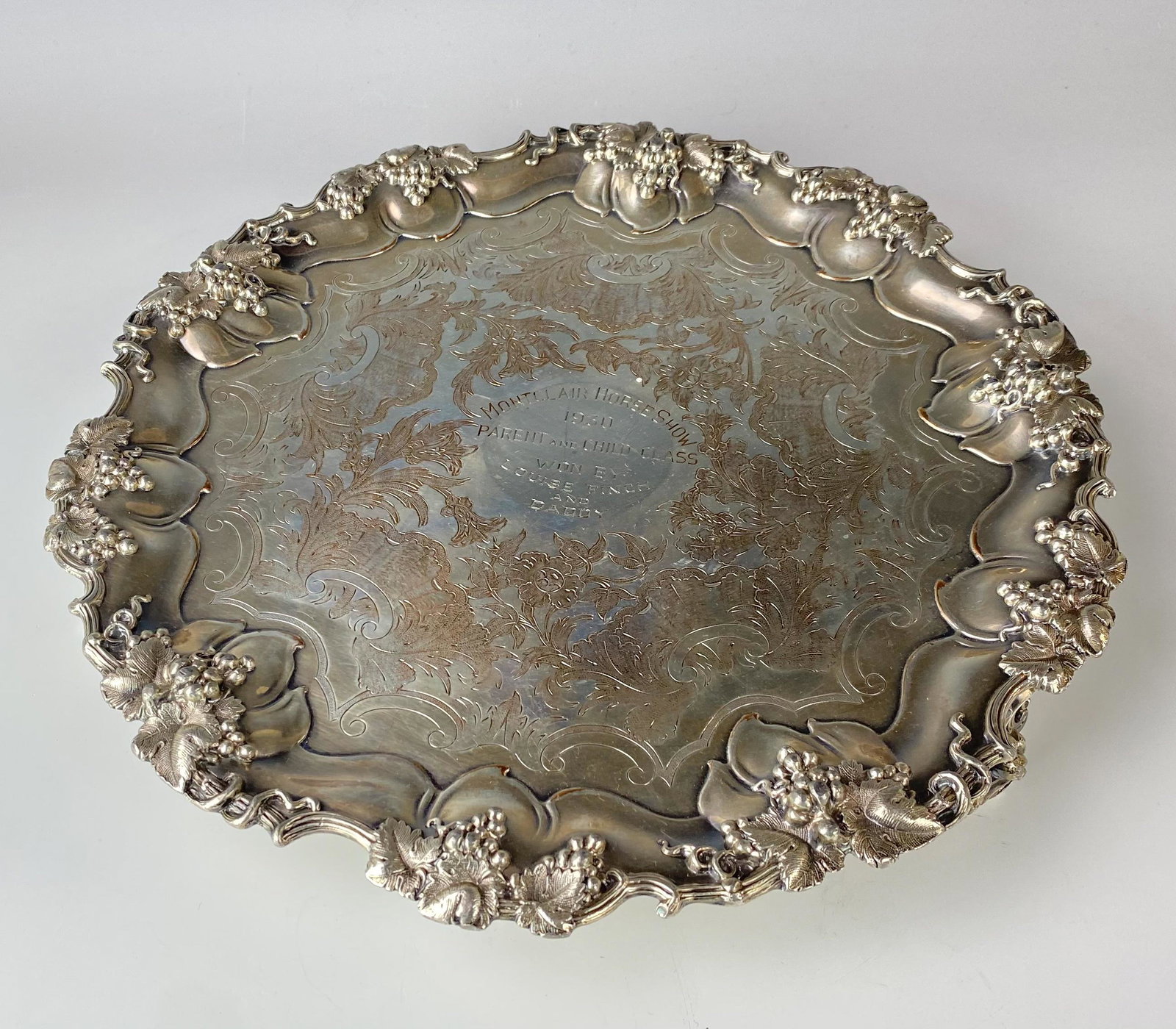 Art Deco Silverplate Horse Show Award Tray Trophy: A nicely modeled silver plated tray graced with a raised relief grape cluster, vine and leaf motif, around the scalloped border.. A centralized monogram in the center with a chased floral motif around