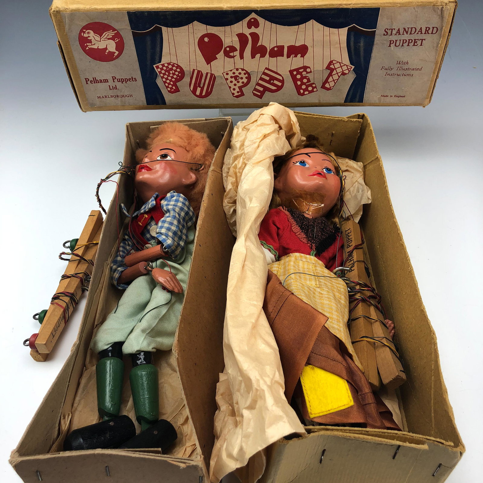 Pelham Marlborough Wilts Hansel & Gretel Puppets: Pelham Marlborough Wilts England Hansel and Gretel Wooden Marionette Puppets. Date between 1955 and 1961. Bob Pelham [ 1919 - 1980 ] started the company as Wonky Toy in 1947 and changed it's name to P
