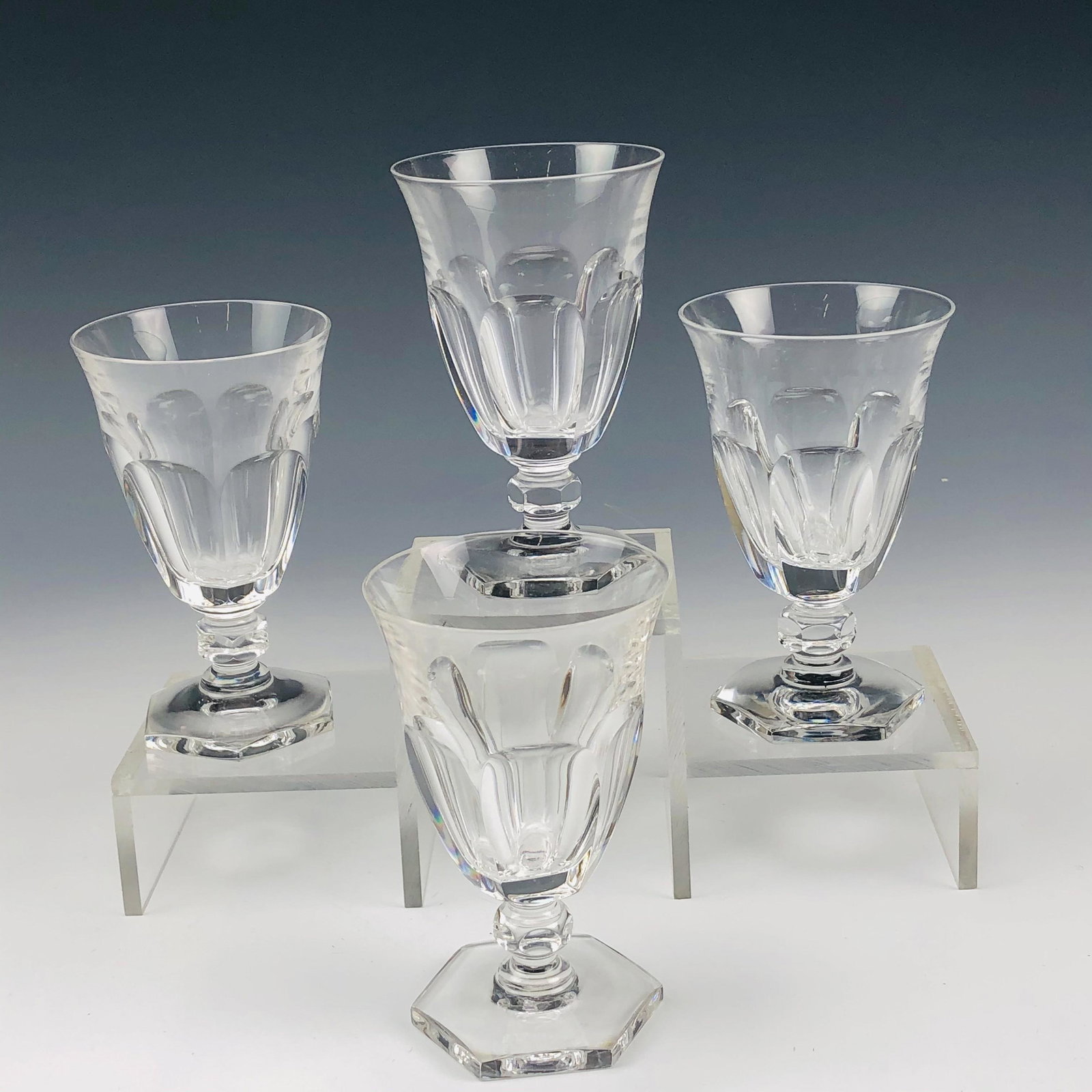 Set 4 Kosta Boda Crystal Geraldine Sherry Goblets: 4 Kosta Boda Sweden Swedish Crystal Art Glass Sherry Goblets modeled in the "Geraldine" pattern which is now discontinued. Design features 6 oval concaves around the body, short knobbed multifaceted s