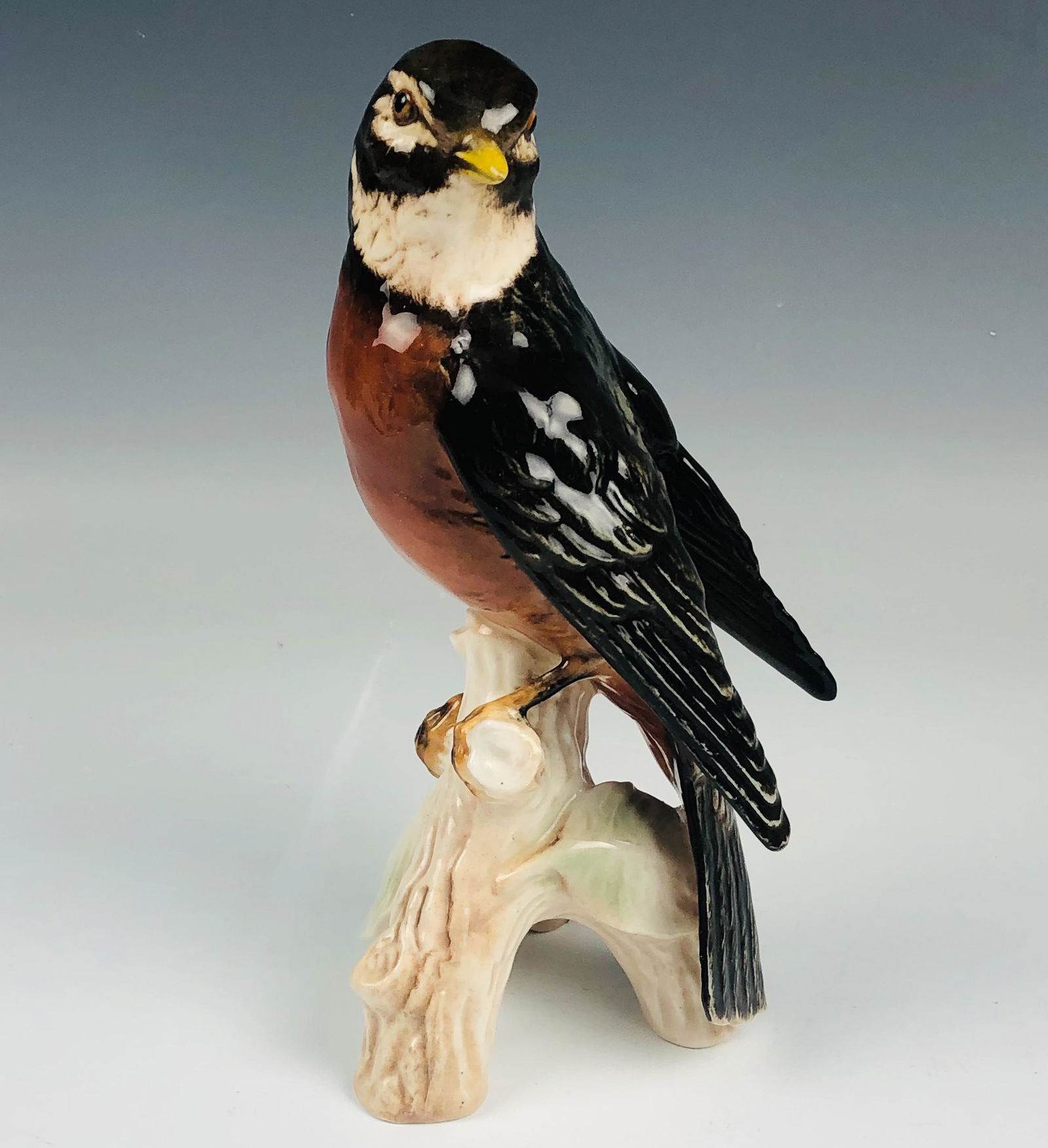 Goebel Robin CV 93 Painted Ceramic Bird Figurine: Goebel Germany Hand Painted German Ceramic Pottery Bird Figurine. Model CV93 . Bears the TMK-5 backstamp also known as the Last bee Mark. Warm painted colors of this pretty migratory songbird. Nicely