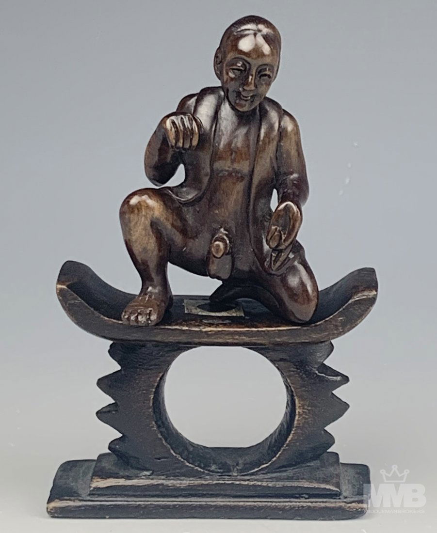 Chinese Erotic Nude Male Wood Sculpture with Stand: Chinese antique carved wood erotic figurine statue. A study of a smiling, kneeling seminude man. Figurine signed with artist stamped signature mark to rear, in area of left buttock. Sold with separate