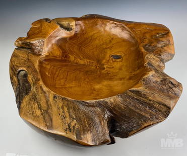 Organic Tree Trunk Teak Wood Center Piece Bowl: Oversized natural teak root wood bowl. Good overall condition with mild storage wear. Measures approximately 6 in. x 25 in. x 25 in. MMB does not ship but will provide third party shipping