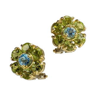 Italian 18K Gold Peridot Topaz Flower Earrings: 18 Karat Yellow Gold Green Peridot and Blue Topaz Flower Earrings. Omega clip back. Stamped, 18K JGJ Italy. Presented in red jewelry box. Good condition, having normal wear. Measures .25 in. x 1.25
