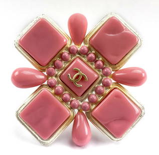 CHANEL Pink Maltese Cross with CC Logo Brooch Pin: Authentic Chanel Pink Maltese Cross with Interlocking CC Logo. From Spring 2004 Collection. Pink salmon coral enamel design in gold tone setting. Signed Chanel, Made in France. 04 P. Rare. Can be