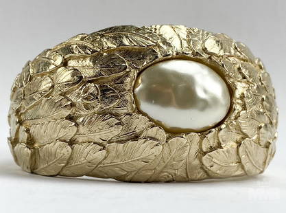 CHANEL Fall 2008 Gold Pearl Feather Cuff Bangle: Authentic Chanel Gold and Faux Oval Pearl Feather Domed Cuff Bangle Bracelet. Intricate gold feather pattern with interlocking CC on upper side of cuff. From Fall 2008 Collection. Oval Chanel