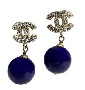CHANEL Boucles Oreille Crystal Purple Earrings: Authentic Chanel Boucles Oreille Gold Double CC Crystal with Purple Enamel Pendant Earrings. Each earring has 22 Chanel crystals set in gold metal signature double CC with purple enamel pendant