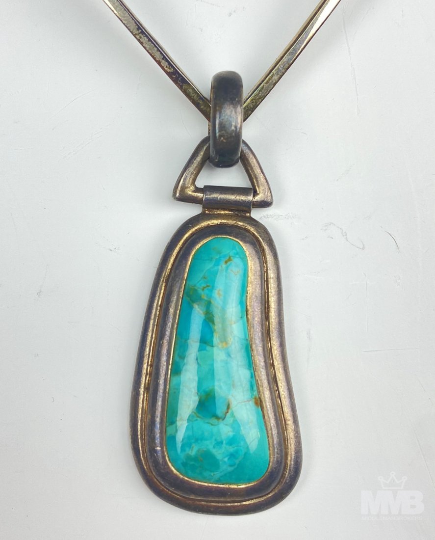 Barse Sterling Silver Turquoise Pendant & Necklace: Barse turquoise stone necklace. Features turquoise stone mounted to a a Sterling silver setting and chain. Marked Barse 925 on verso. Good overall condition with mild storage wear. Measures approximat