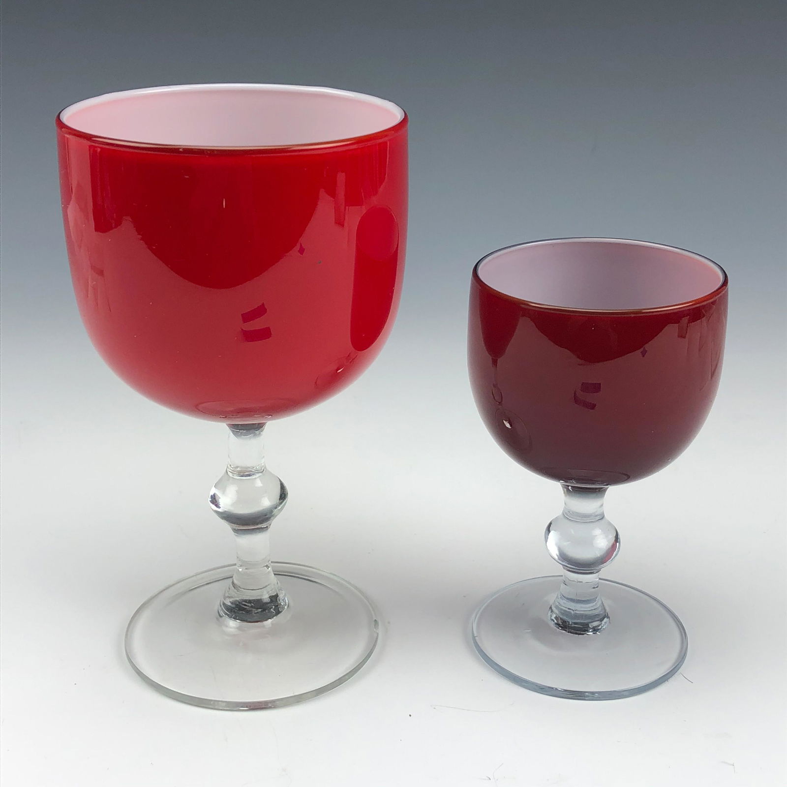Carlo Moretti Bar Barware Port & Wine Glass Goblet: Established in 1958 in Murano, Venice by brothers Carlo & Giovanni Moretti. Painstakingly mouth blown in manner. Intense blood red exterior masterfully accented by a crisp white cased interior. Clear